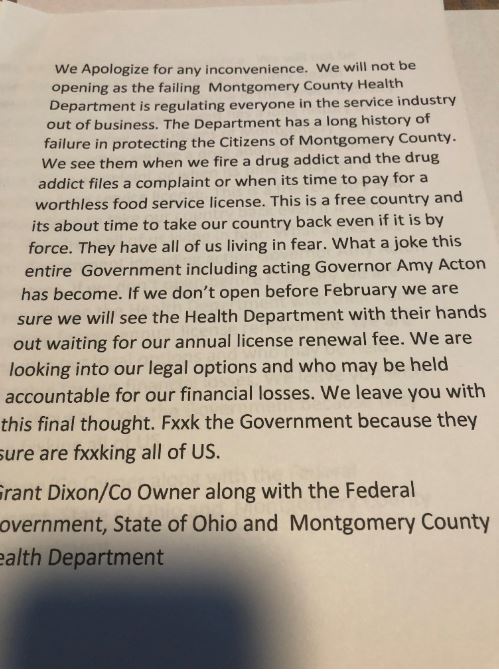 Grant Dixon, the owner of Club Evolution in downtown Dayton, said he will reopen his bar on June 1 with or without the governor's permission. Dixon says this noted is posted on the businesses door.