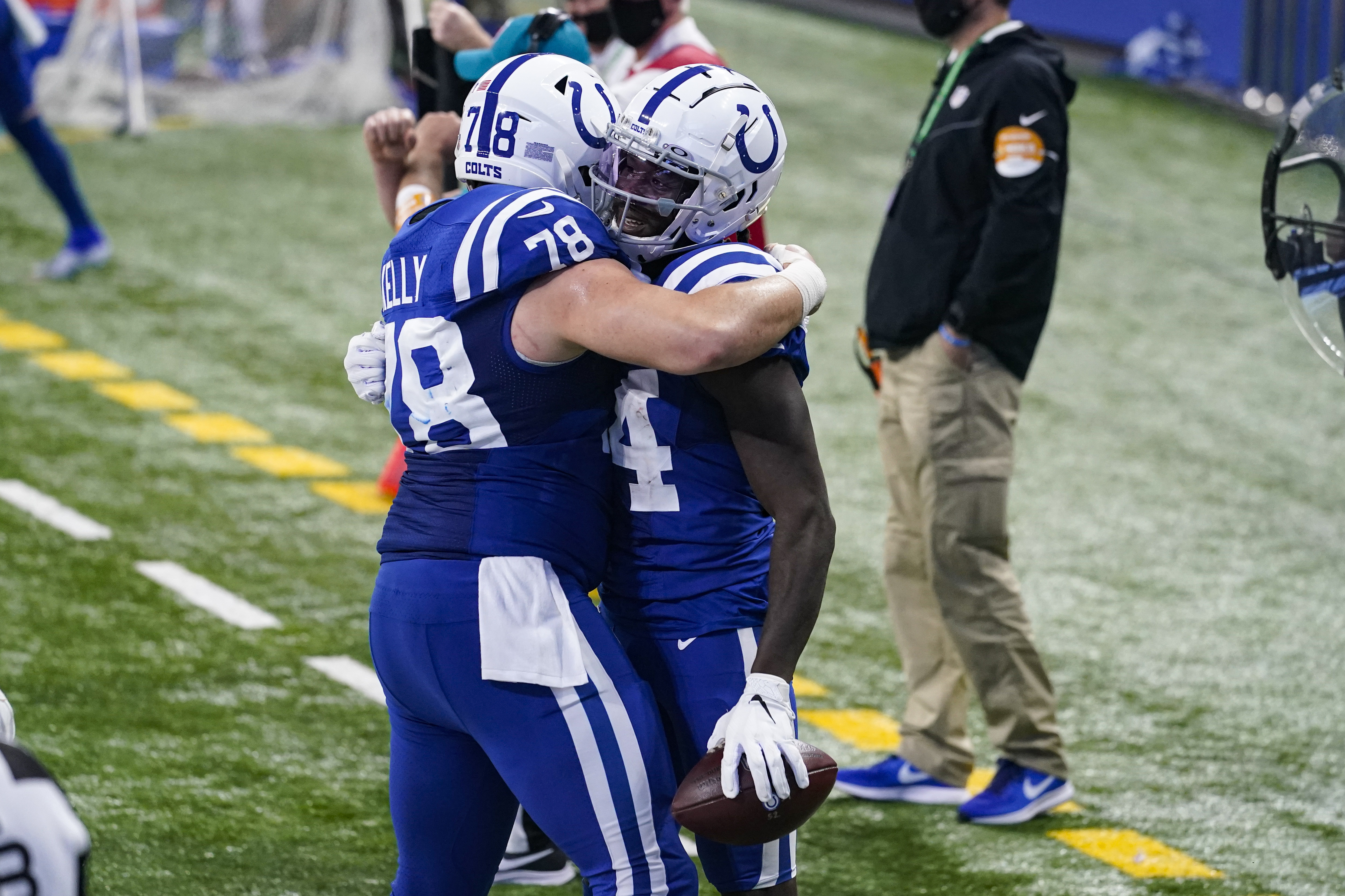 Indianapolis Colts wide receiver Zach Pascal (14) celebrates a touchdown with center Ryan Kelly (78) in the second half of an NFL football game against the Houston Texans in Indianapolis, Sunday, Dec. 20, 2020. (AP Photo/Darron Cummings)