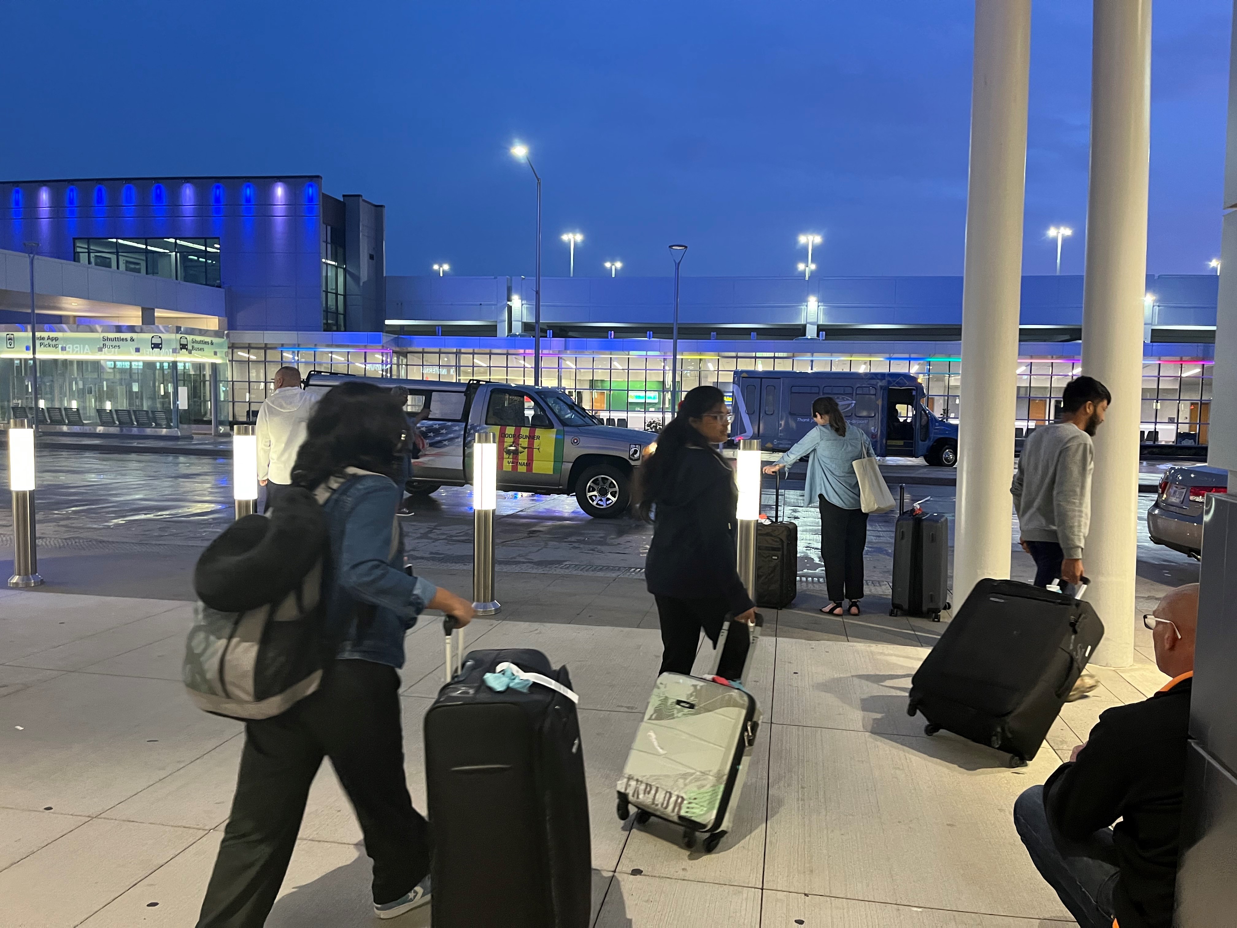 Travelers leaving the Dayton International Airport. CORNELIUS FROLIK / STAFF