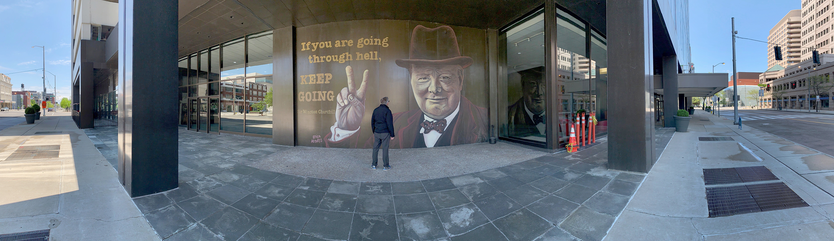 Winston Churchill, prime minister of Great Britain during much of World War II, is the subject of the latest downtown Dayton mural on the Stratacache Tower. The image of Churchill, painted by mural artist Erica Arndts, is accompanied by a quote he is associated with, âIf you are going through hell, keep going.â LISA POWELL / STAFF