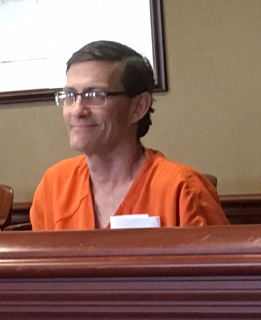 Jason Cooper, charged with nine felony charges for allegedly stealing a Middletown police cruiser and ramming abother, was arraigned today in Butler County Common Pleas Court. LAUREN PACK/STAFF