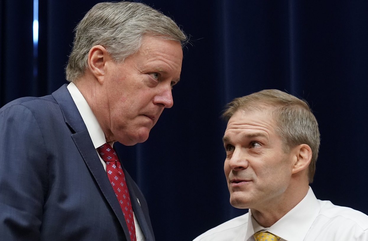 Rep. Mark Meadows (R-N.C.), left, and Ranking Member Rep. Jim Jordan (R-Ohio) talk at a hearing of the House Oversight and Reform Committee where Michael Cohen, President Donald Trump's former personal lawyer, gave testimony, on Capitol Hill in Washington, Feb. 27, 2019. (Erin Schaff/The New York Times)