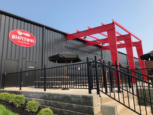 Dayton-based Warped Wing Brewing Co. will open its ambitious new second location, The Warped Wing Barrel Room & Smokery, to the public on Saturday, Aug. 29, in Springboro. MARK FISHER/STAFF
The 20,000-square-foot facility at the crossroads of Springboro at State Routes 73 and 741 will house a tap room, a restaurant, an outdoor biergarten-style patio, a large space for barrel-aging beers, a test-pilot brewery, a distribution hub and event space