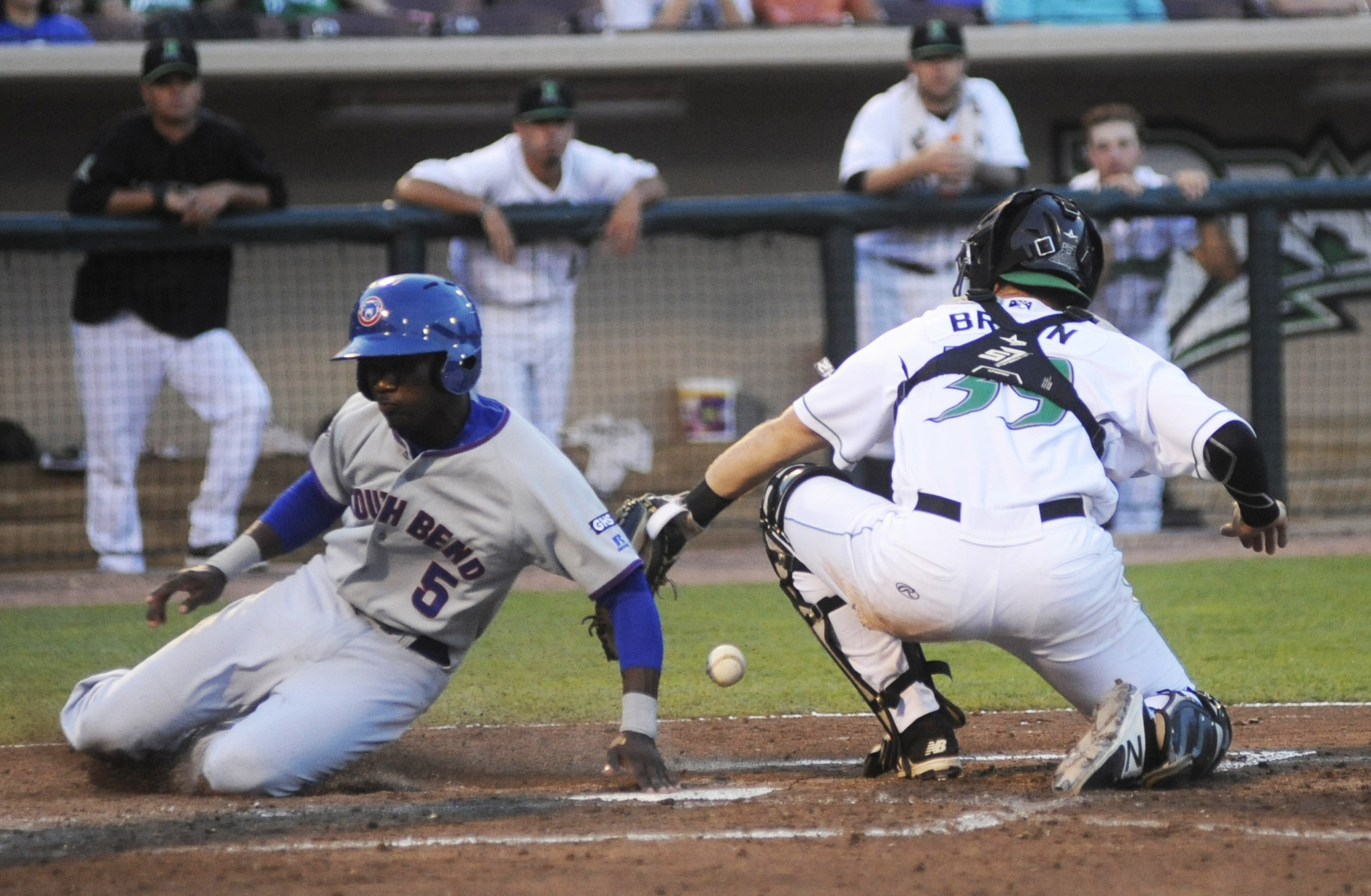 Dragons catcher Cassidy Brown couldn't hold on to a tag out of Cubs infielder Andruw Monasterio. The Dragons hosted South Bend at Dayton's Fifth Third Field in a Class A minor-league baseball game on Monday, July 10, 2017. MARC PENDLETON / STAFF