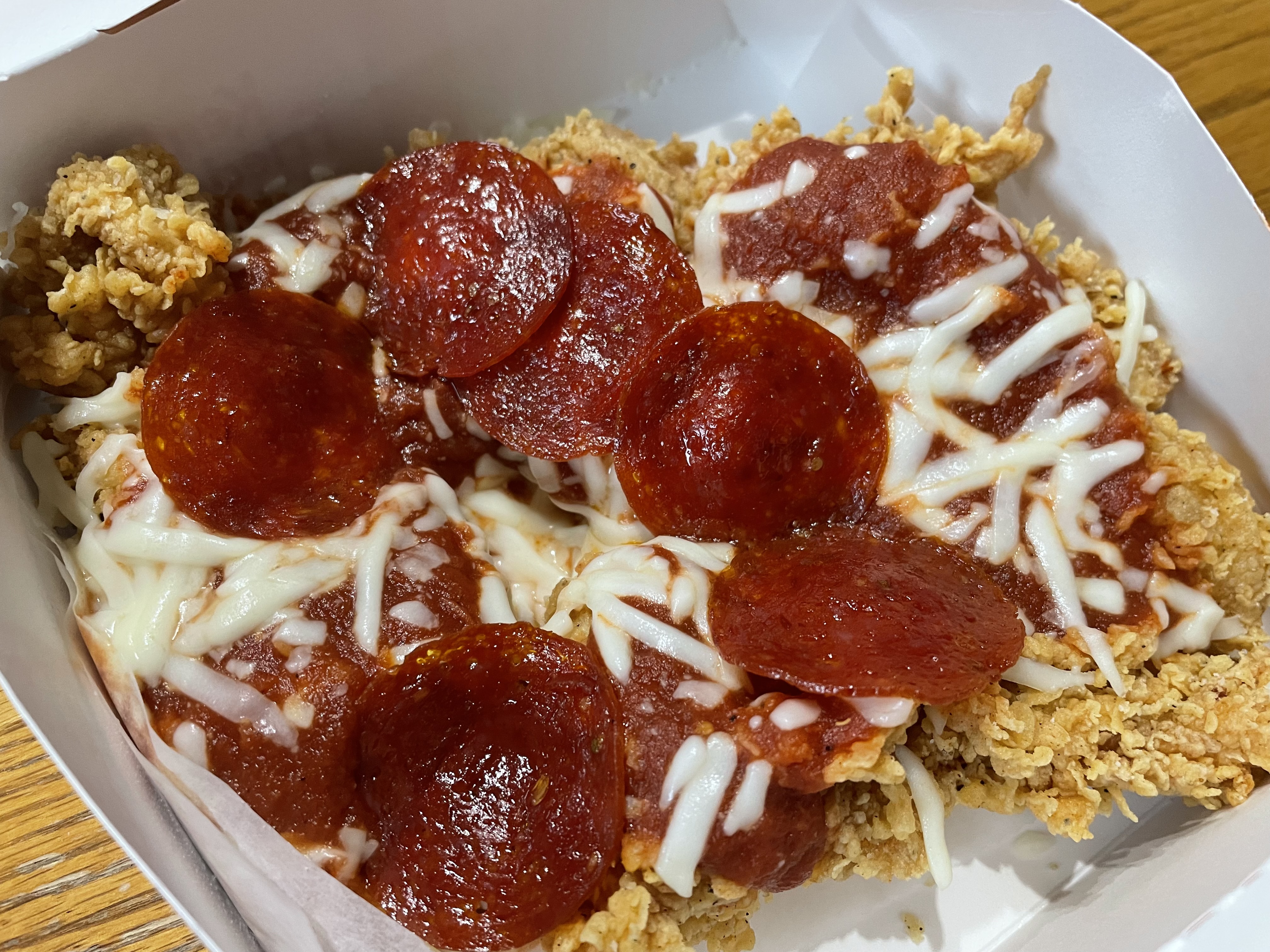 Fried chicken and pizza: Reporter tries KFC's Chizza, a new menu item