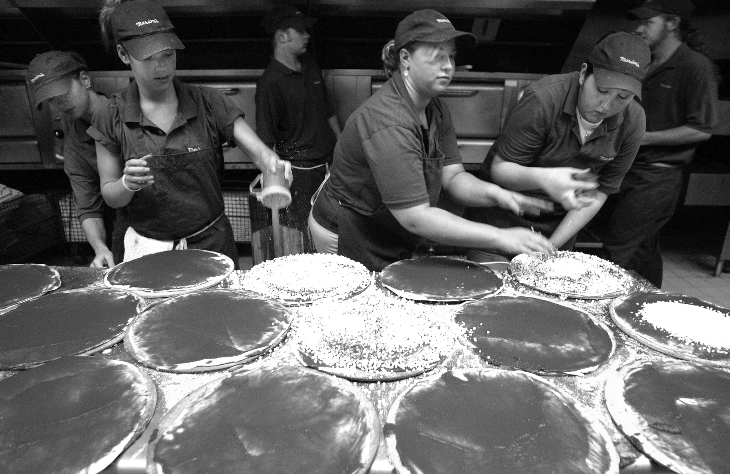 Marion's Piazza marked its 40th anniversary by selling their pizza at 1965 prices. The line for pizza wrapped around the store at Patterson Road. DAYTON DAILY NEWS ARCHIVE