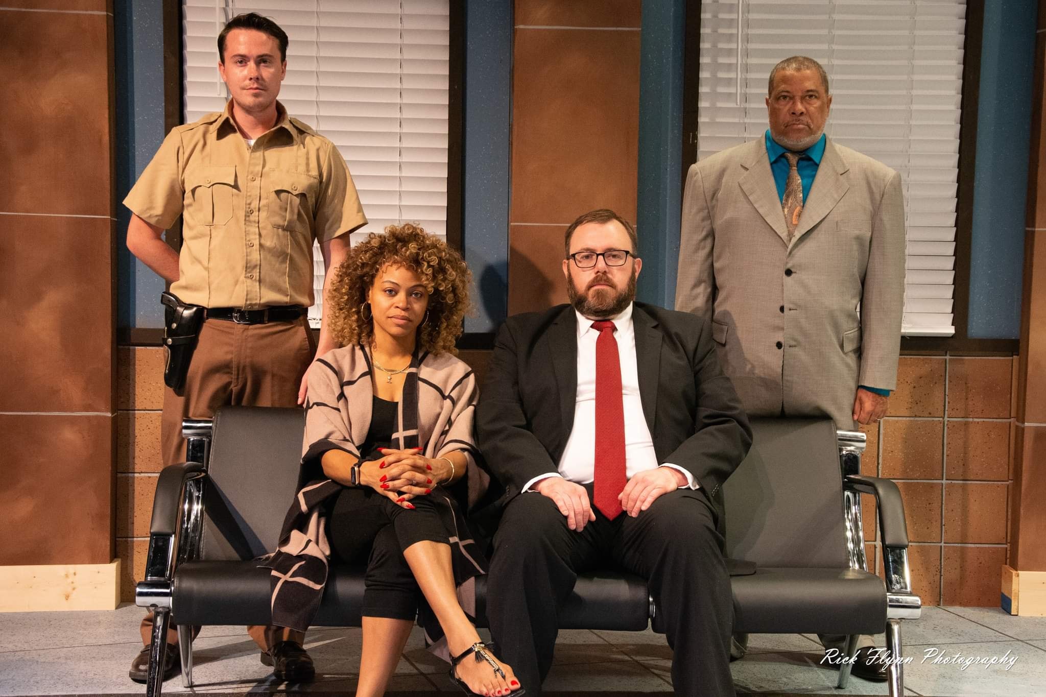(left to right) Nathan Evans (Paul Larkin), Teresa Lynn (Kendra Ellis Connor), Robert Brumberg (Scott Connor) and Franklin Johnson (John Stokes) in Dayton Playhouse's production of "American Son."