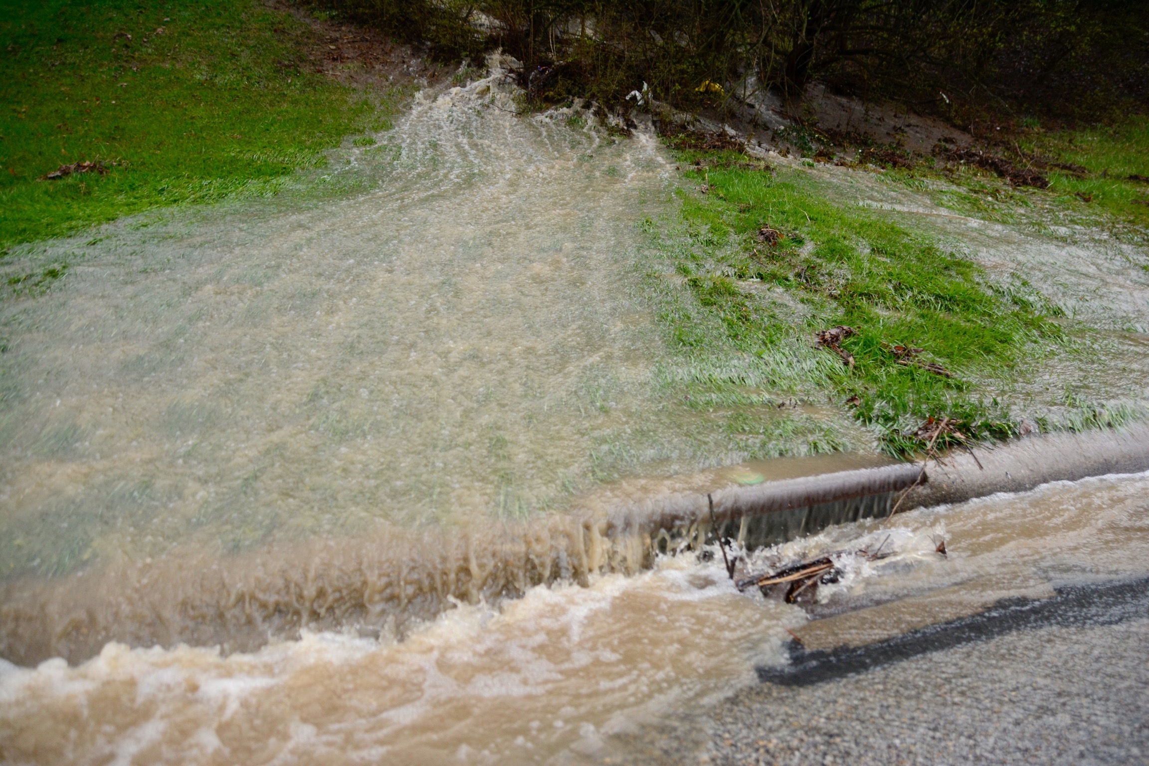 Tuesday morning, April 3, 2018, rains lead to some flooding around Butler County, including in the back yards of some homes on Evalie Drive in the city of Fairfield.