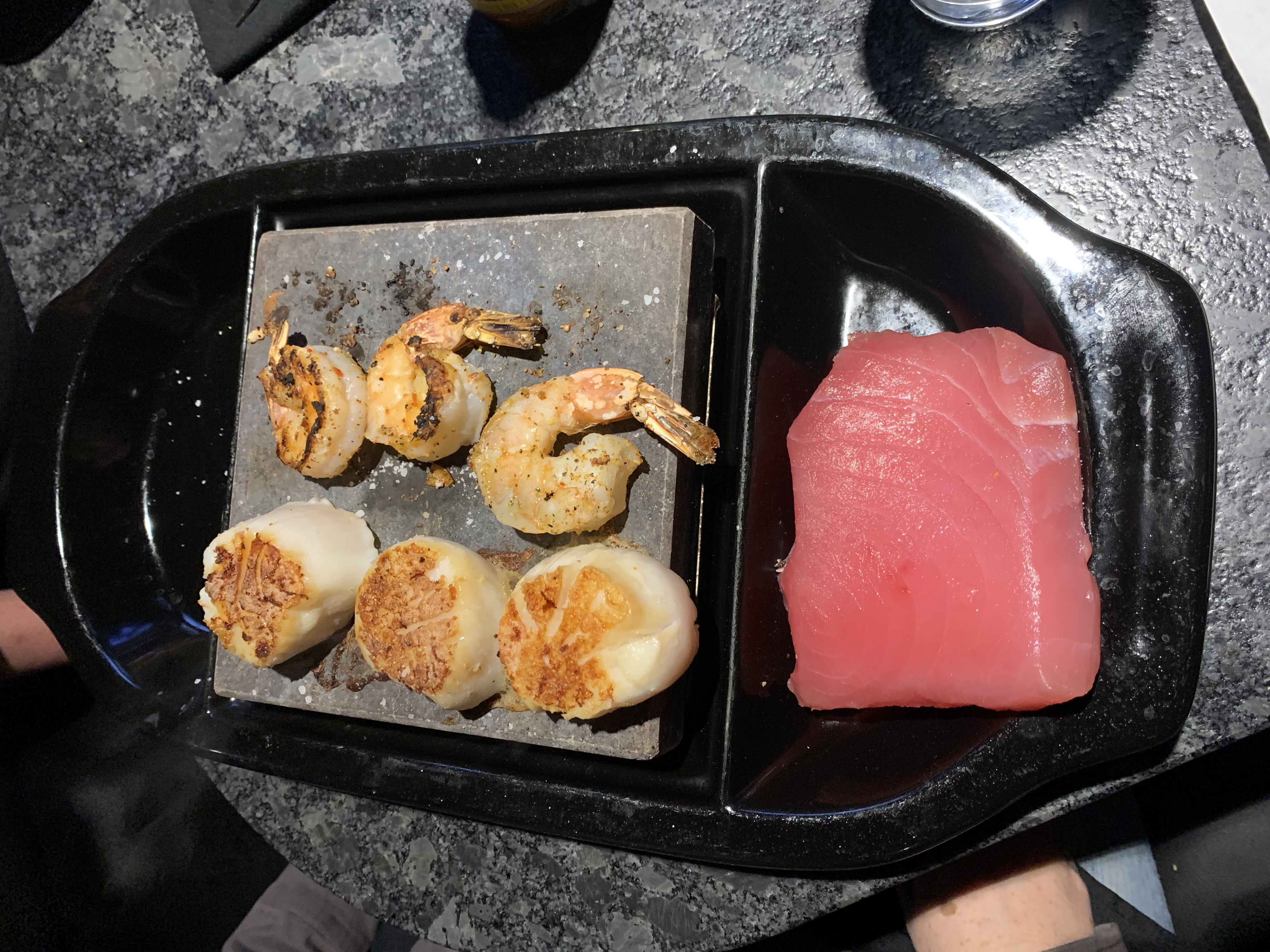 Scallops and shrimp cooking at Black Rock Bar and Grill with an Ahi tuna steak on deck. CONTRIBUTED/ALEXIS LARSEN