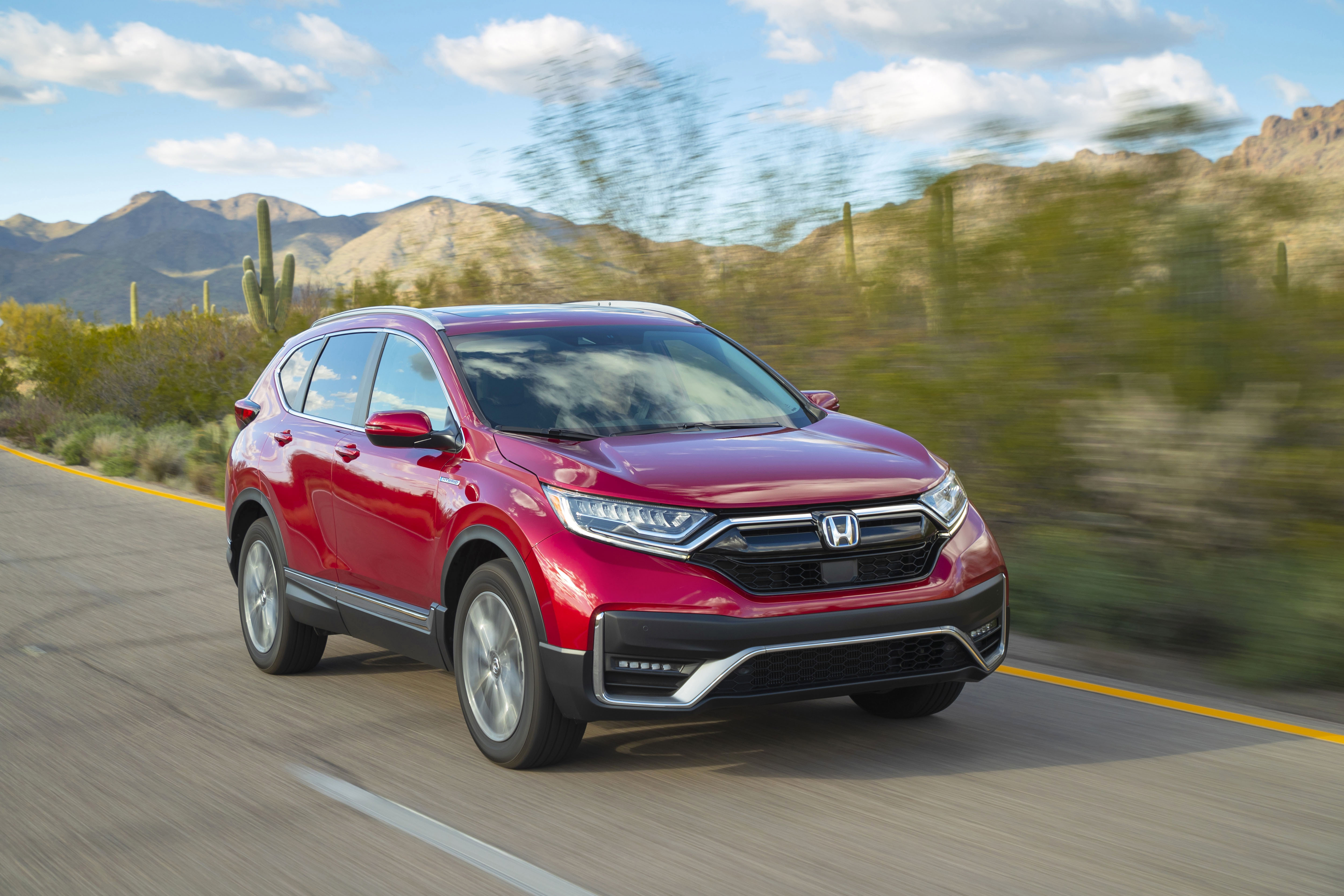 This photo provided by Honda shows a 2021 Honda CR-V Hybrid, an all-wheel-drive hybrid crossover SUV. (American Honda Motor Co. via AP)