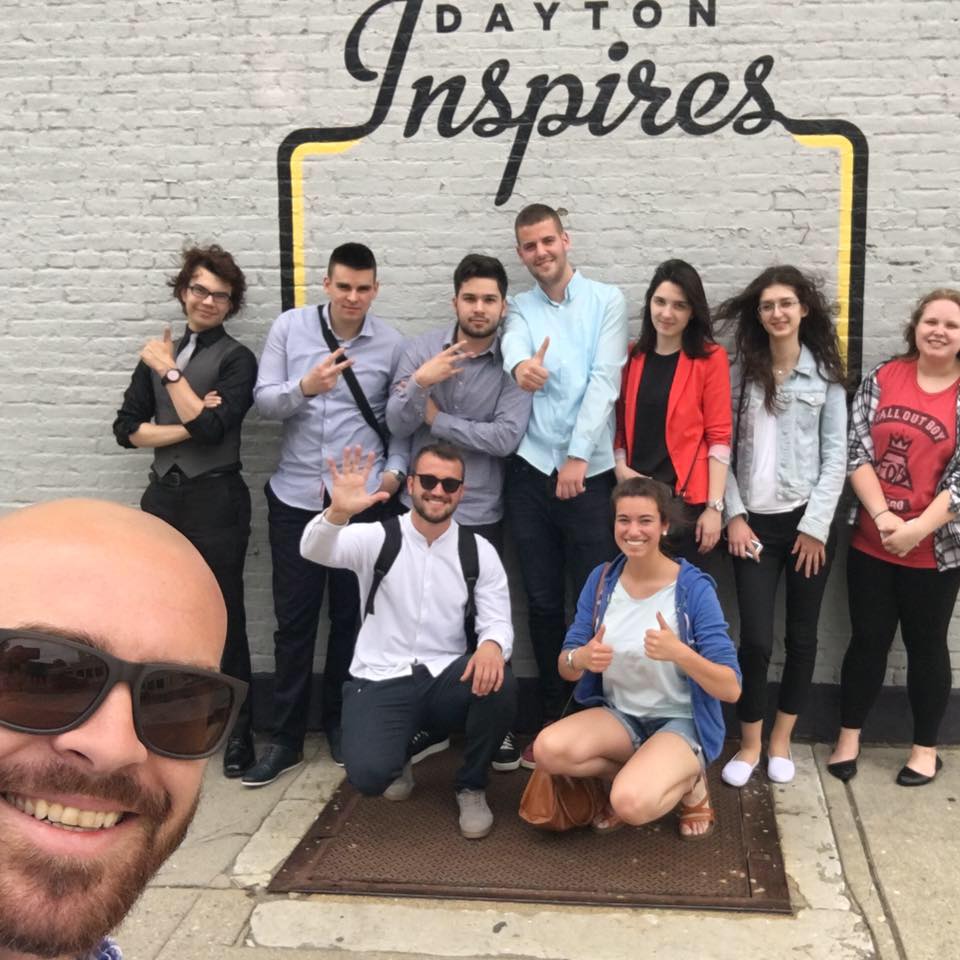 Arch Grieve (front), a mediation specialist at the Dayton Mediation Center, is the new chair of the Dayton Sister City Committee and is vice president of the Dayton Council on World Affairs. He is pictured with a group from Bosnia and Herzegovina in front of the Dayton Inspires mural in the Oregon District.