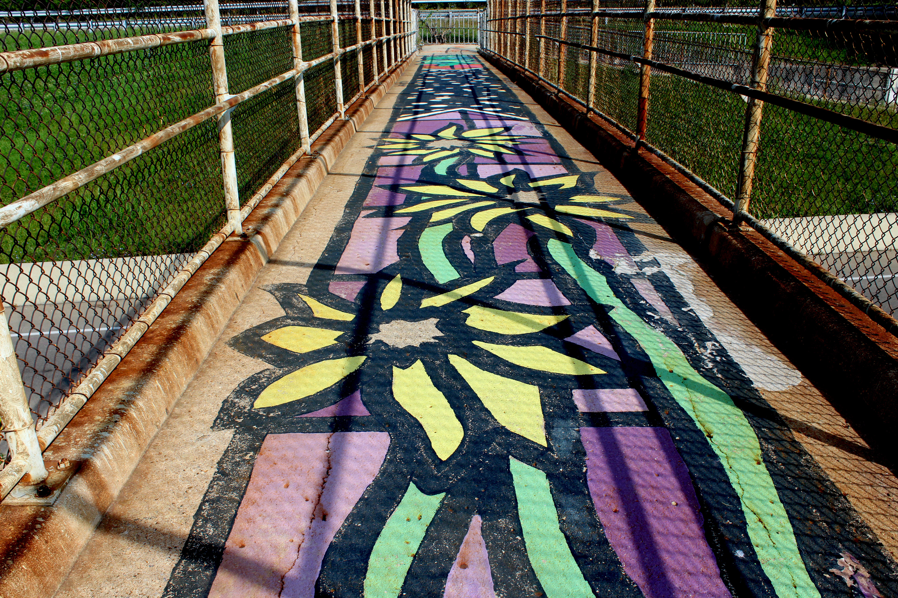 The US 35 pedestrian bridge between South Park and the Oregon District was painted by upDayton volunteers in 2012.