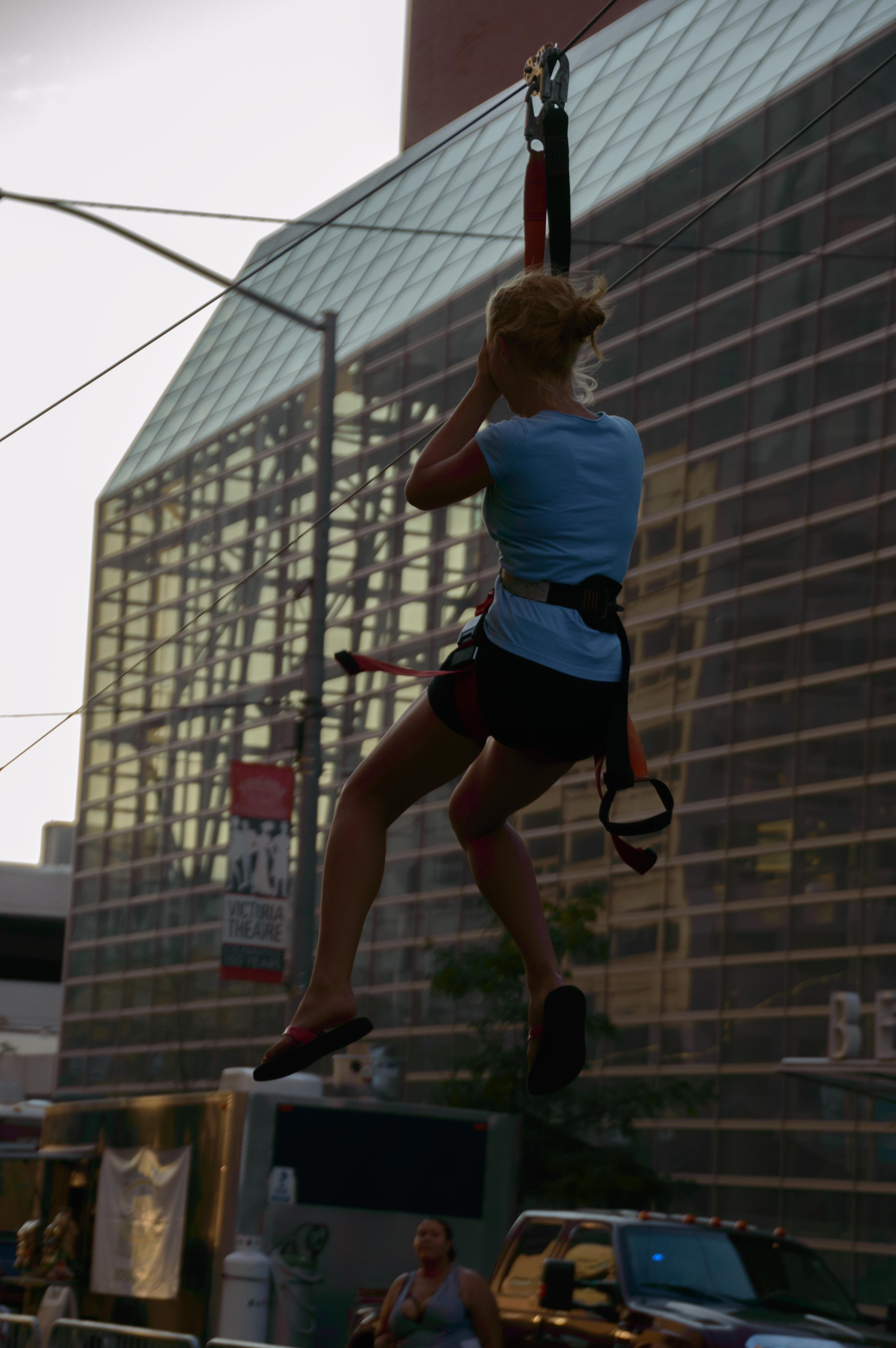 There was never a dull moment during First Friday and Downtown Adventure Night, in downtown Dayton, on Friday, Aug. 5. Among the many activities the event included were food trucks, beer, paddle boarding in the fountain, zip lining, live fitness demonstrations, the Over The Edge Drop Party and more. (TOM GILLIAM/CONTRIBUTED)