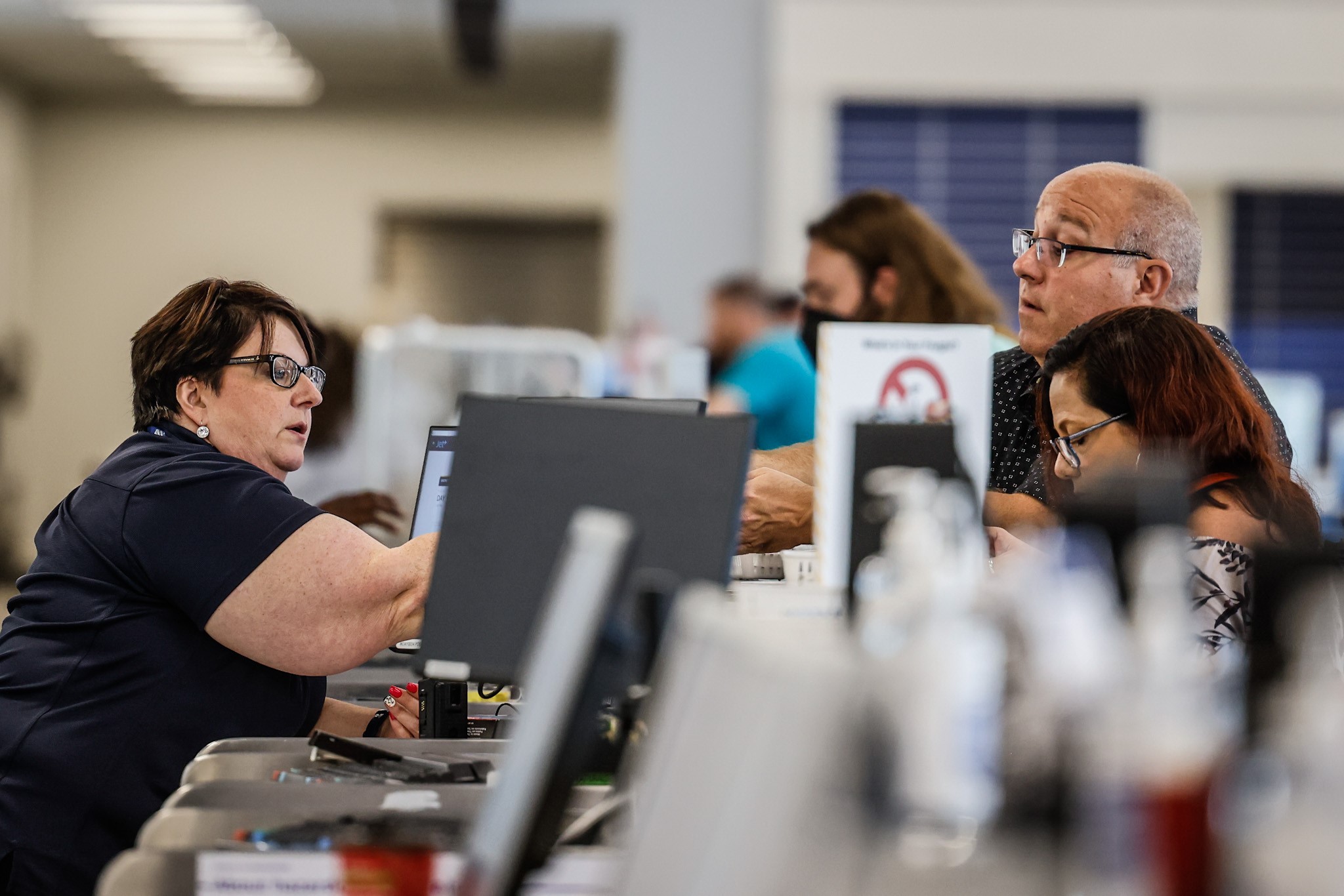 Flyers at the Dayton International Airport check in at the Delta Airline ticket counter before traveling Friday July 15, 2022.
JIM NOELKER/STAFF