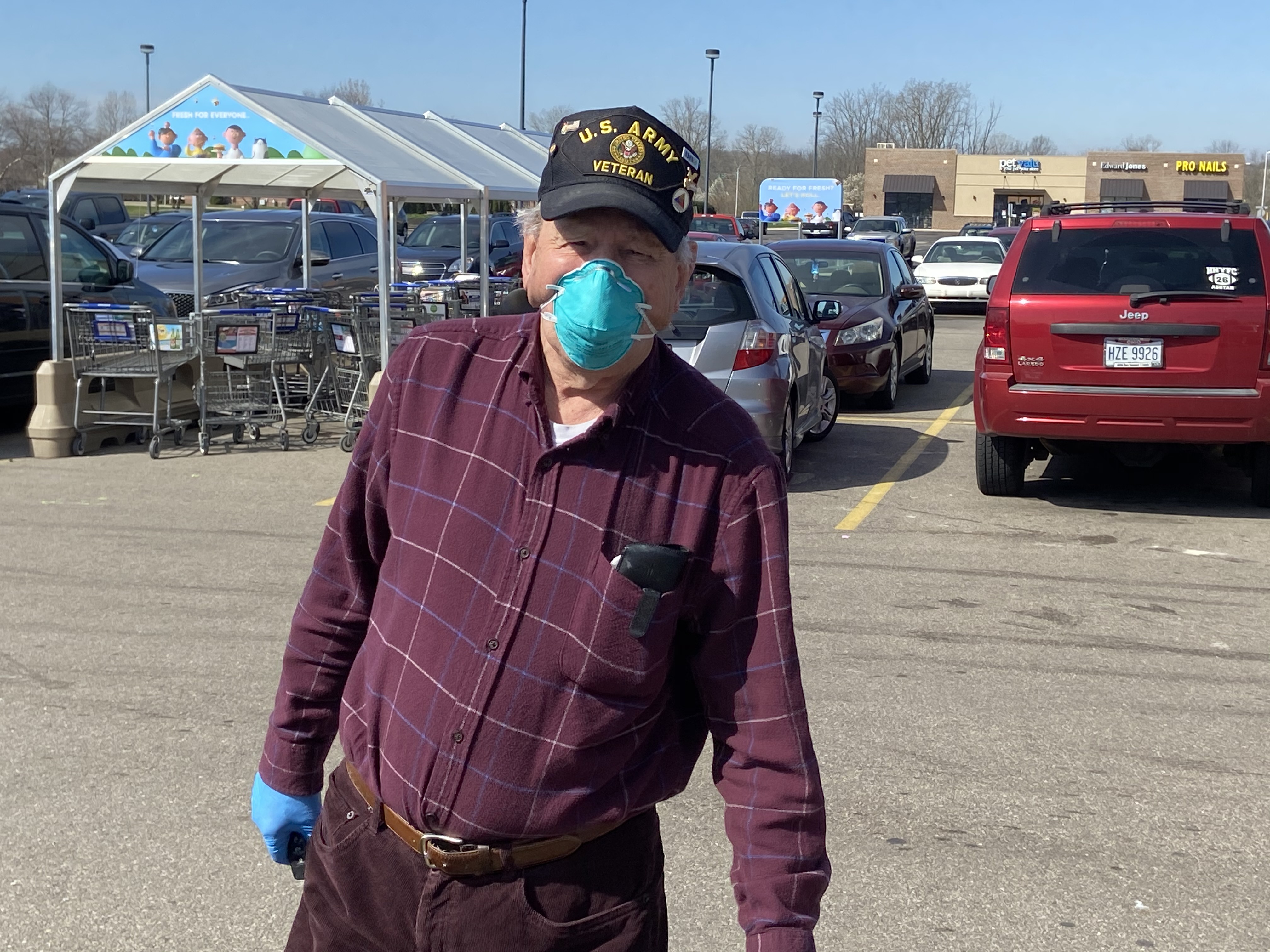 Robert Preston of Fairborn wore a mask and gloves while shopping at the Kroger grocery store on Dayton-Yellow Springs Street recently. The Army veteran said everyone should be required to wear a mask to slow the spread of COVID-19.