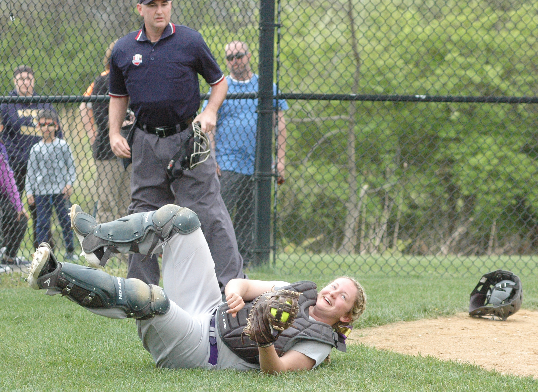 Eaton catcher Becca Mowen grabs a foul popup Wednesday during a Southwestern Buckeye League Southwestern Division softball game at Monroe. Eaton won 5-1. RICK CASSANO/STAFF