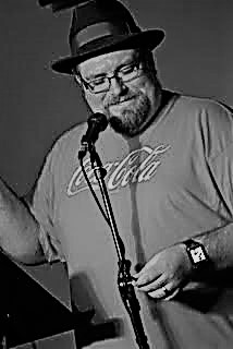 Dayton Poetry Slam co-host Lincoln “Link” Schreiber.