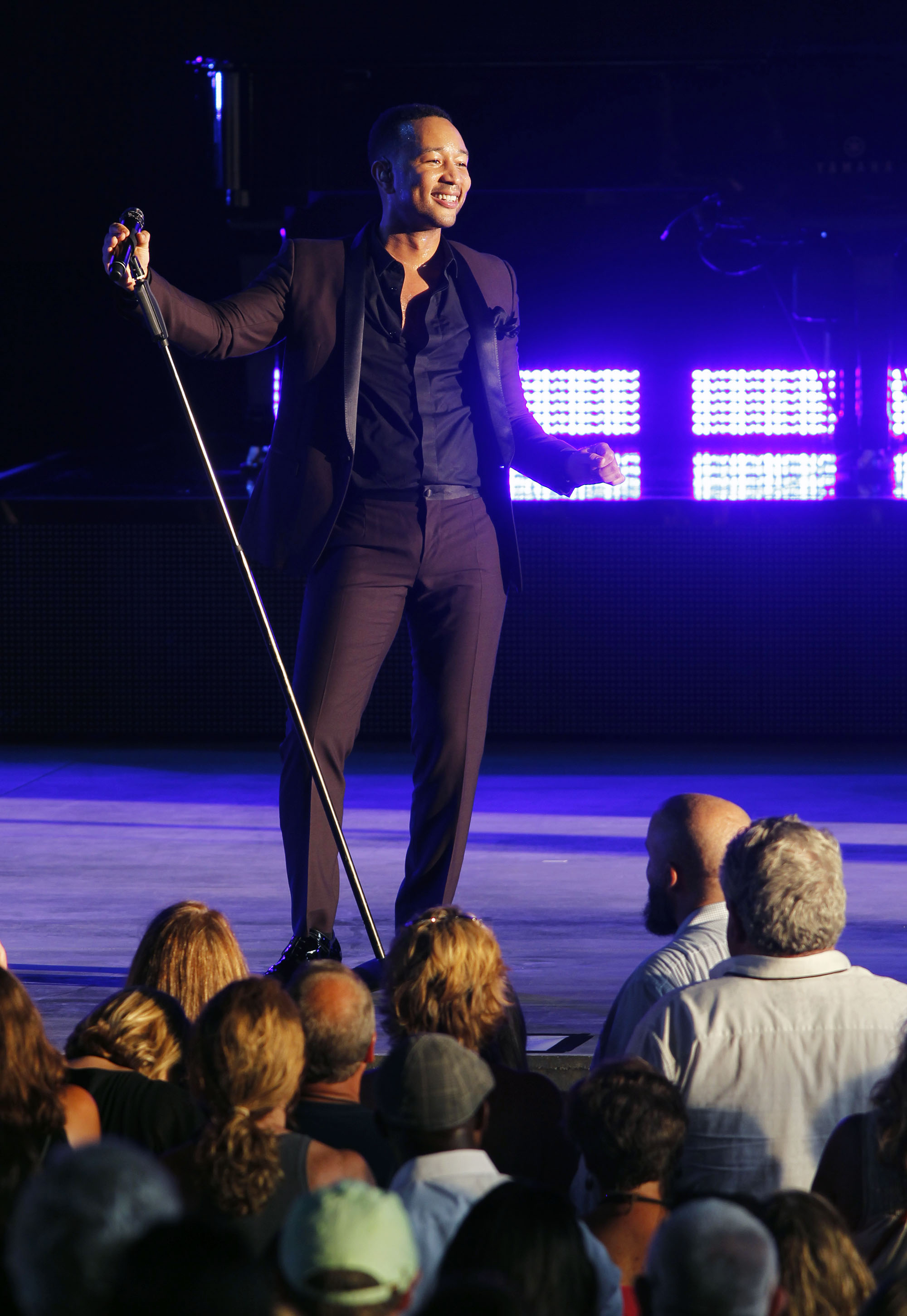 John Legend performs at the Rose Music Center on Monday evening.. TY GREENLEES / STAFF