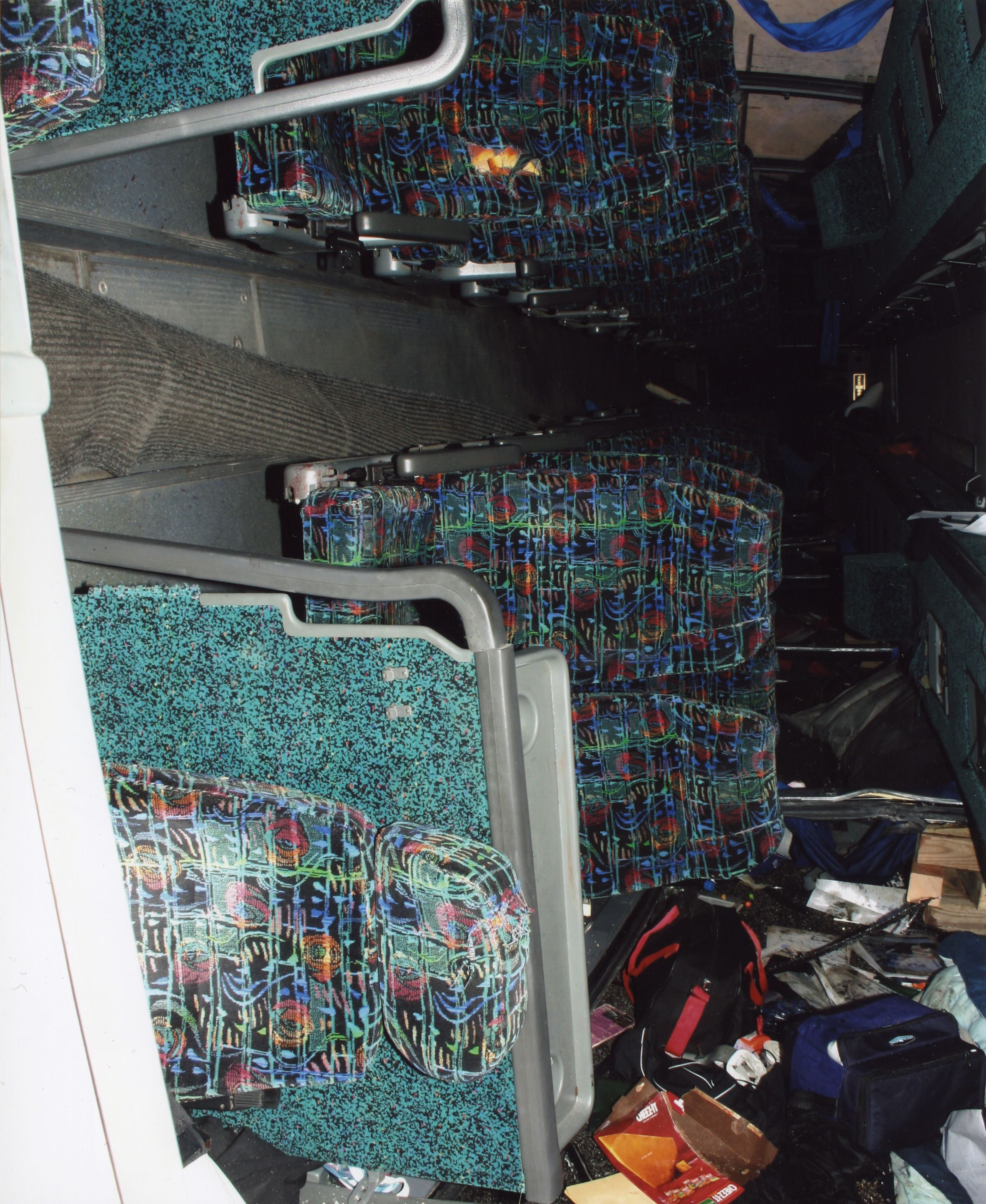A coach bus carrying the Bluffton University baseball team is seen on its side after crashing and falling off an exit ramp on to Interstate 75.