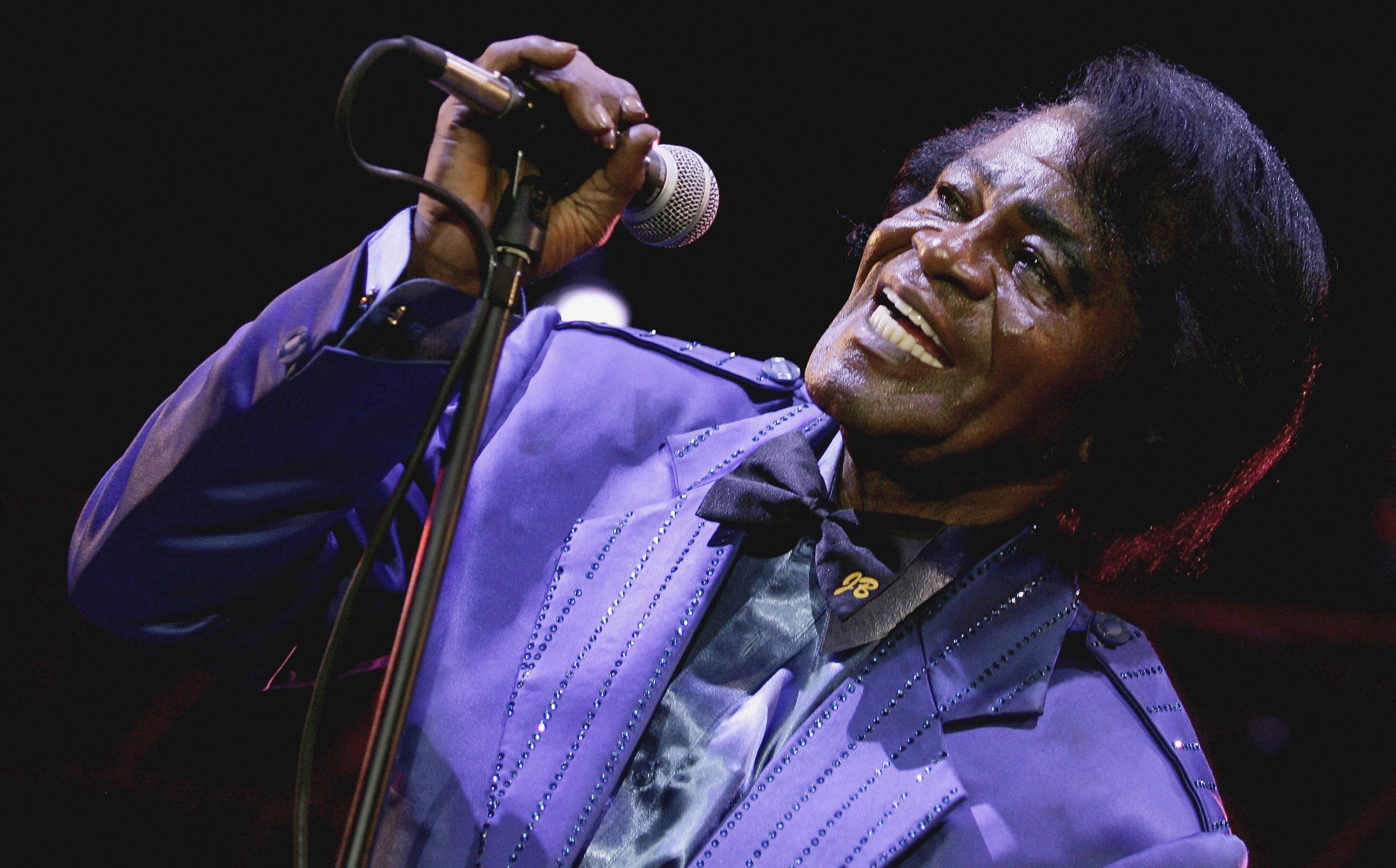 LONDON - JULY 04: Singer James Brown performs as part of HM Tower Of London Festival Of Music's inaugural jazz and opera festival at HM Tower of London on July 4, 2006 in London. (Photo by Gareth Cattermole/Getty Images)