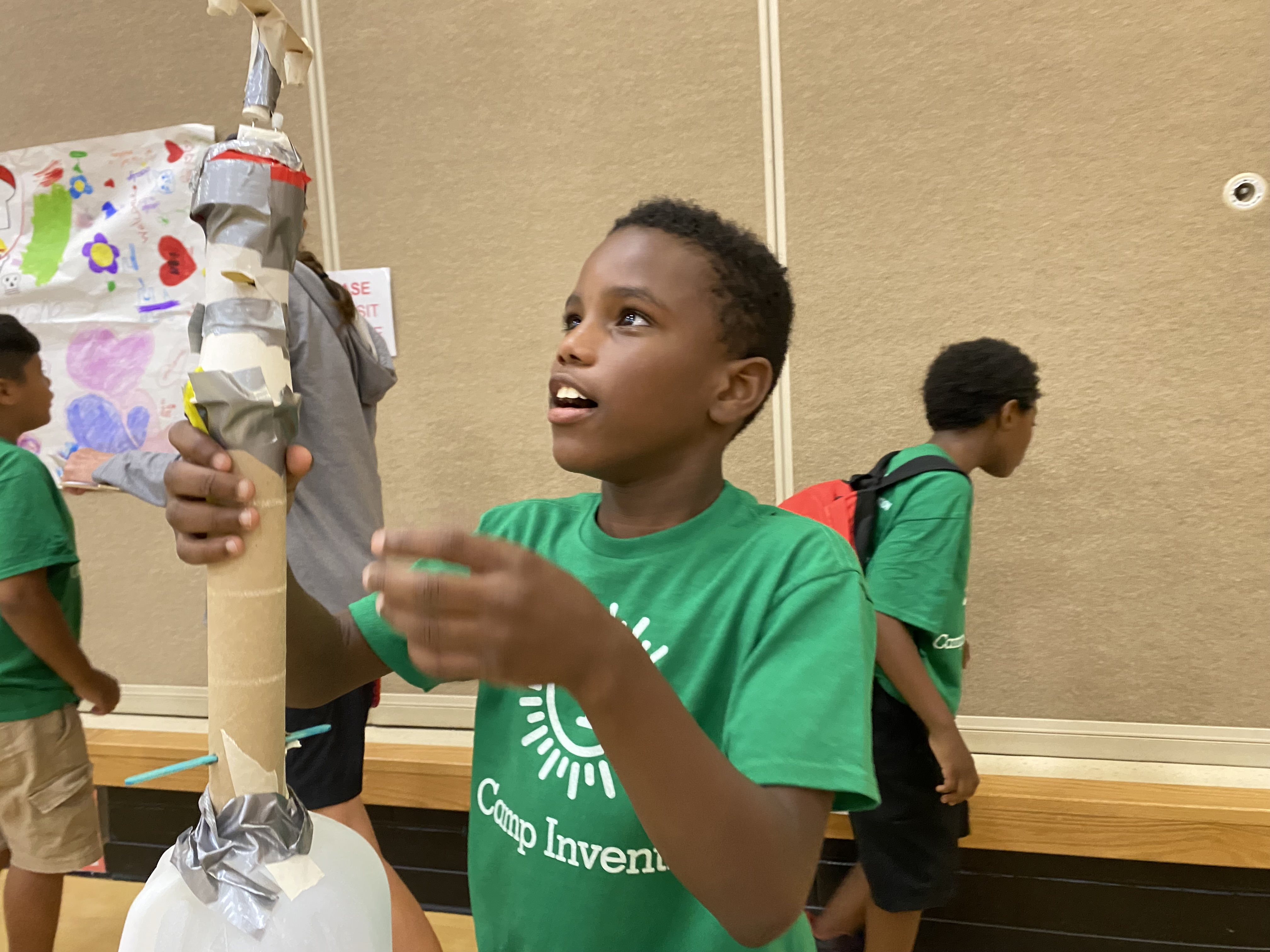 Timothy Williams, an incoming fifth-grader, shows his STEM camp project at Wright Brothers Elementary in Huber Heights on July 1. EILEEN McCLORY / STAFF