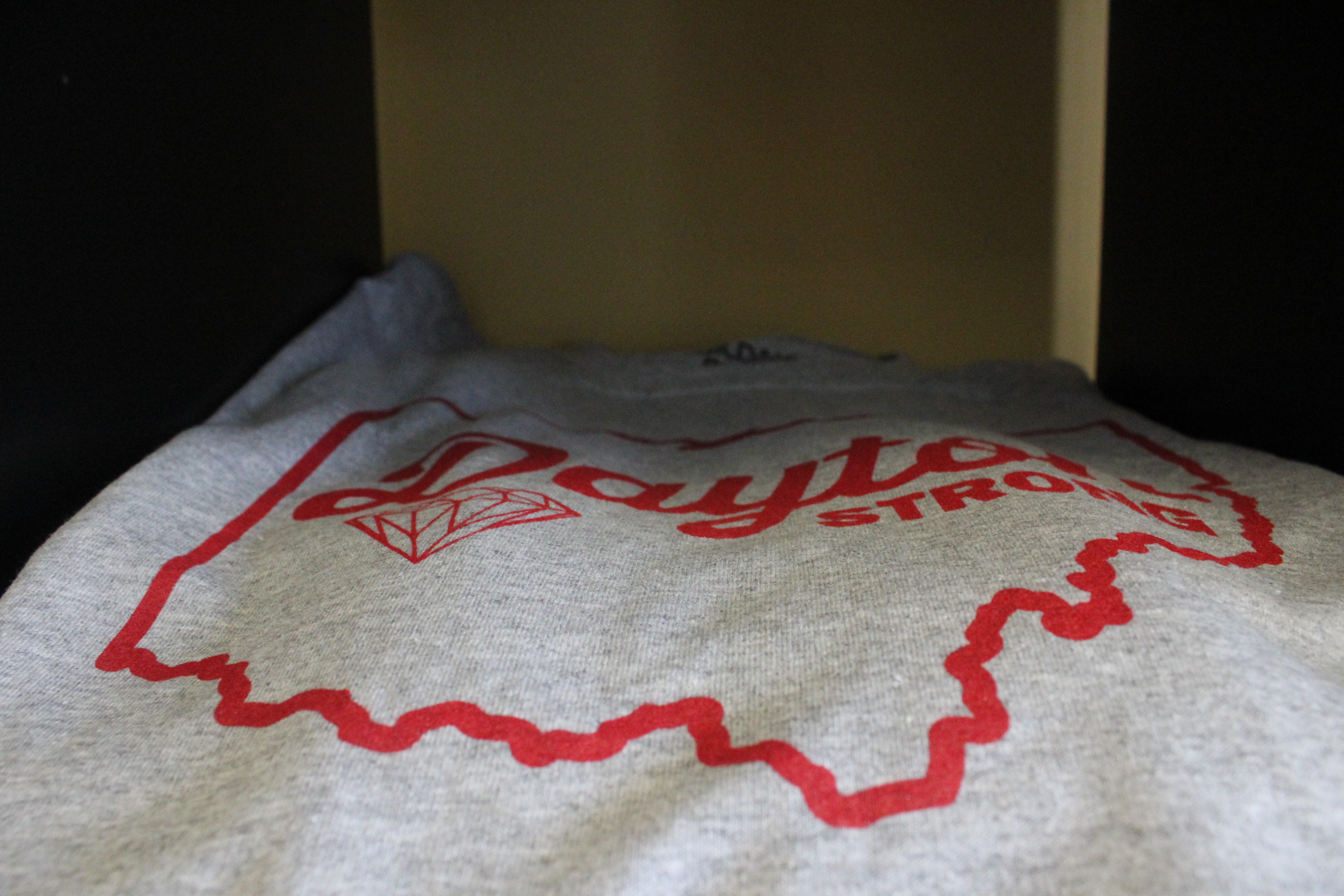 Chief Screen Printing owners Anthony Tomlinson and James Webster have raised nearly $5,500 through the sale of Dayton Strong T-shirts.