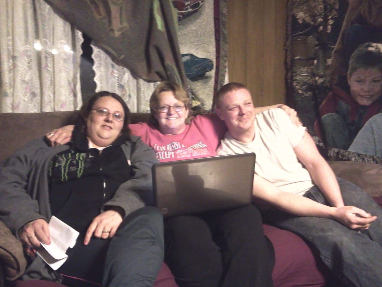 Alicia Paulus is on the left. Her brother is on the right and mom in the middle.