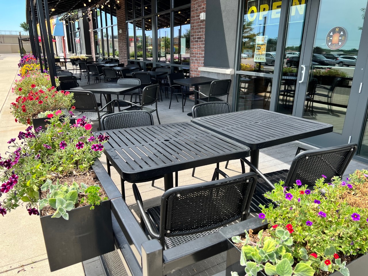 The patio at MELT on the Mall at Fairfeld Commons provides shade and protection from the elements while dining.
