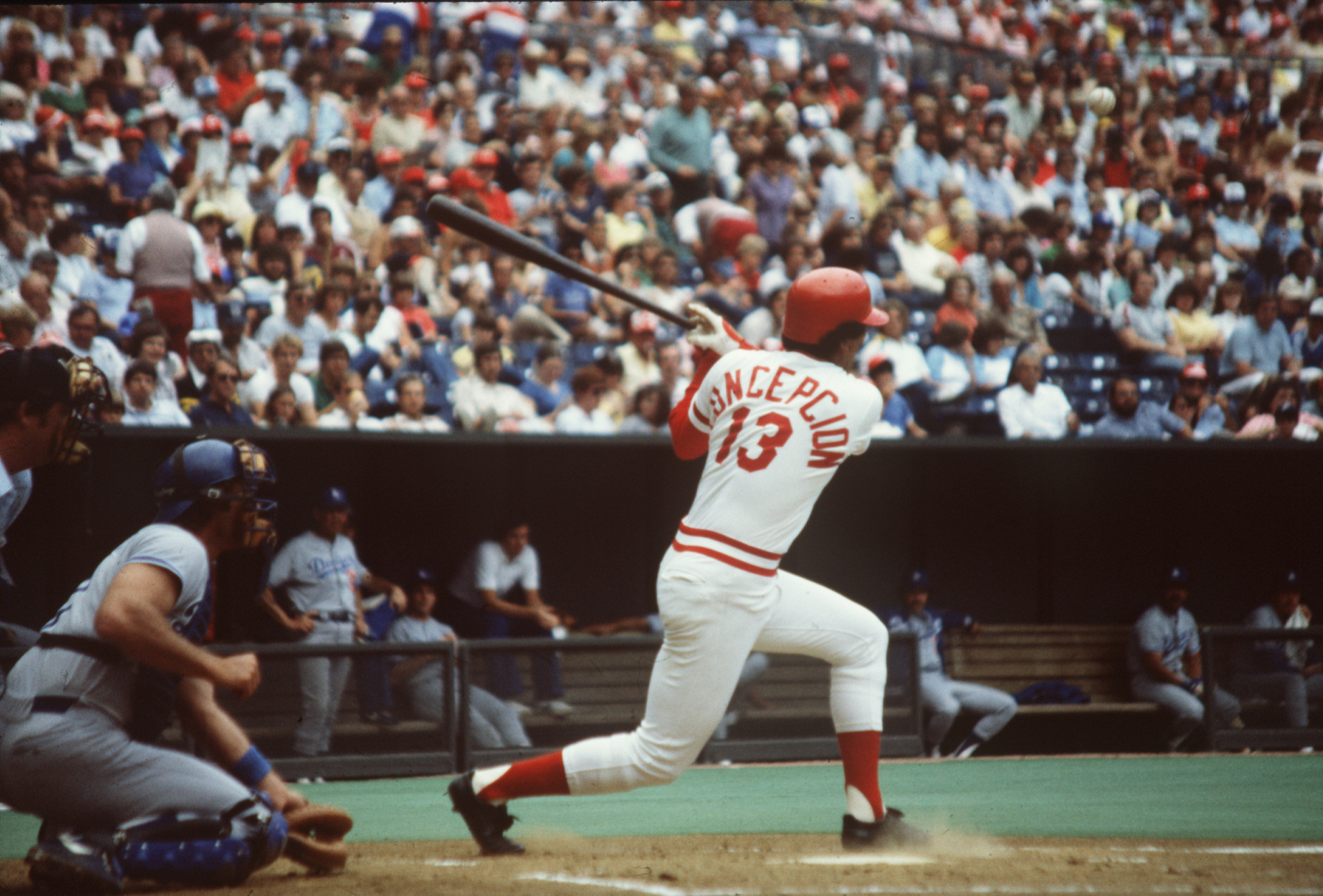 Pete Rose Jr., 7, takes throws from his dad Pete Rose, not shown, and  Cincinnati Reds