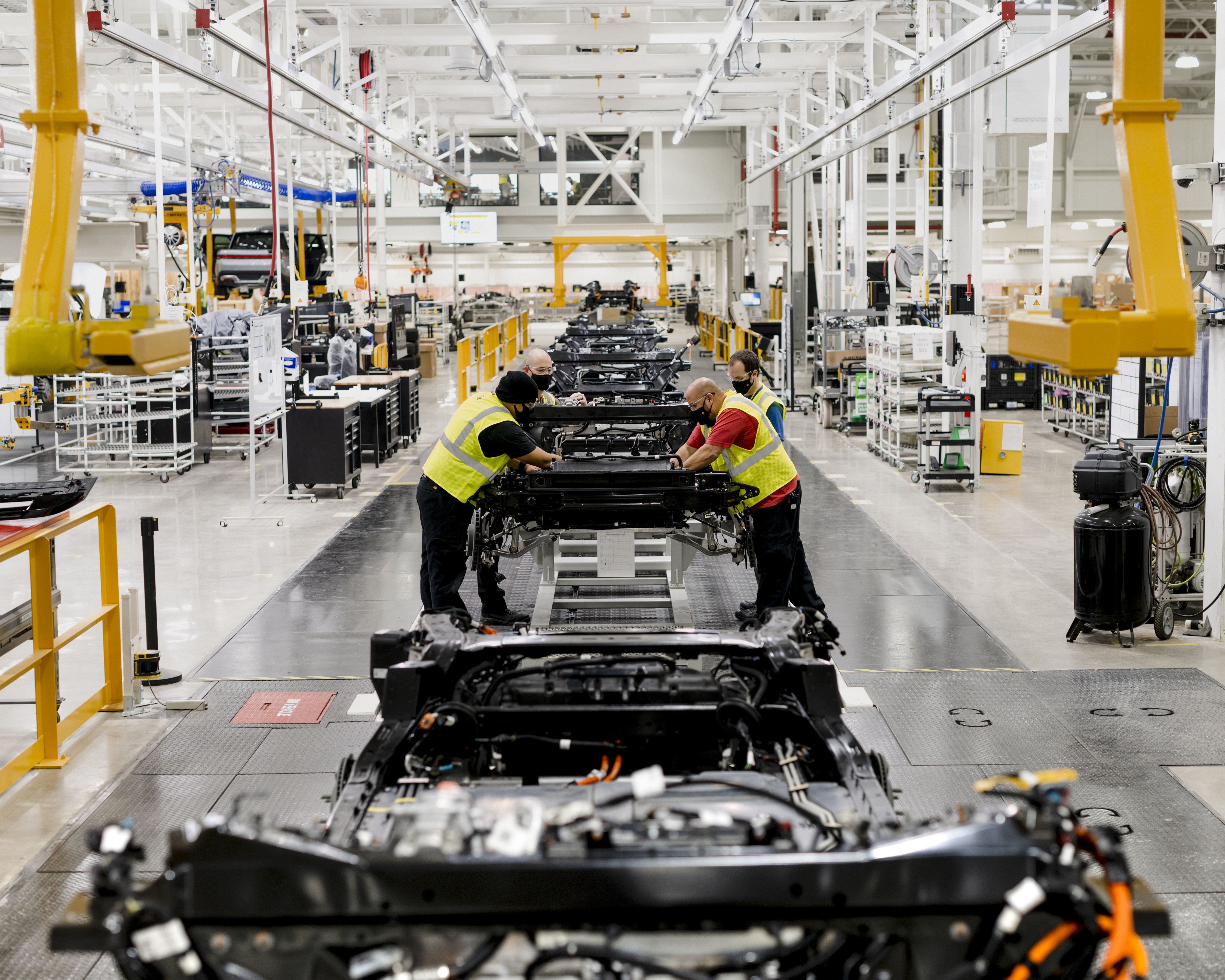 An assembly line at Rivian’s electric truck factory in Normal, Il., Jan. 13, 2021. Shares in Rivian soared on their first day of trading, Nov. 10, 2021, hoisting the company’s market value well above that of large established automakers even before it begins significant production. (Lyndon French/The New York Times).....