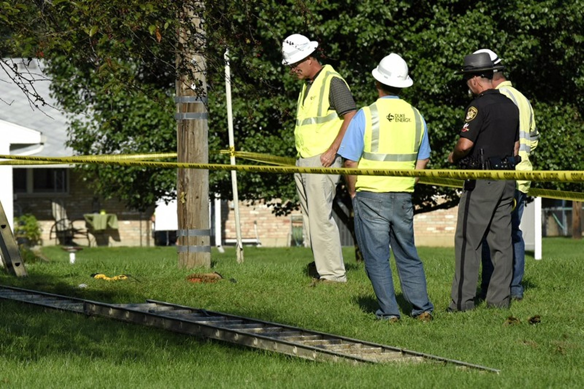 Emergency crews responded to the 4300 block of Walnut Street for an accident involving electric line workers. NICK GRAHAM/STAFF