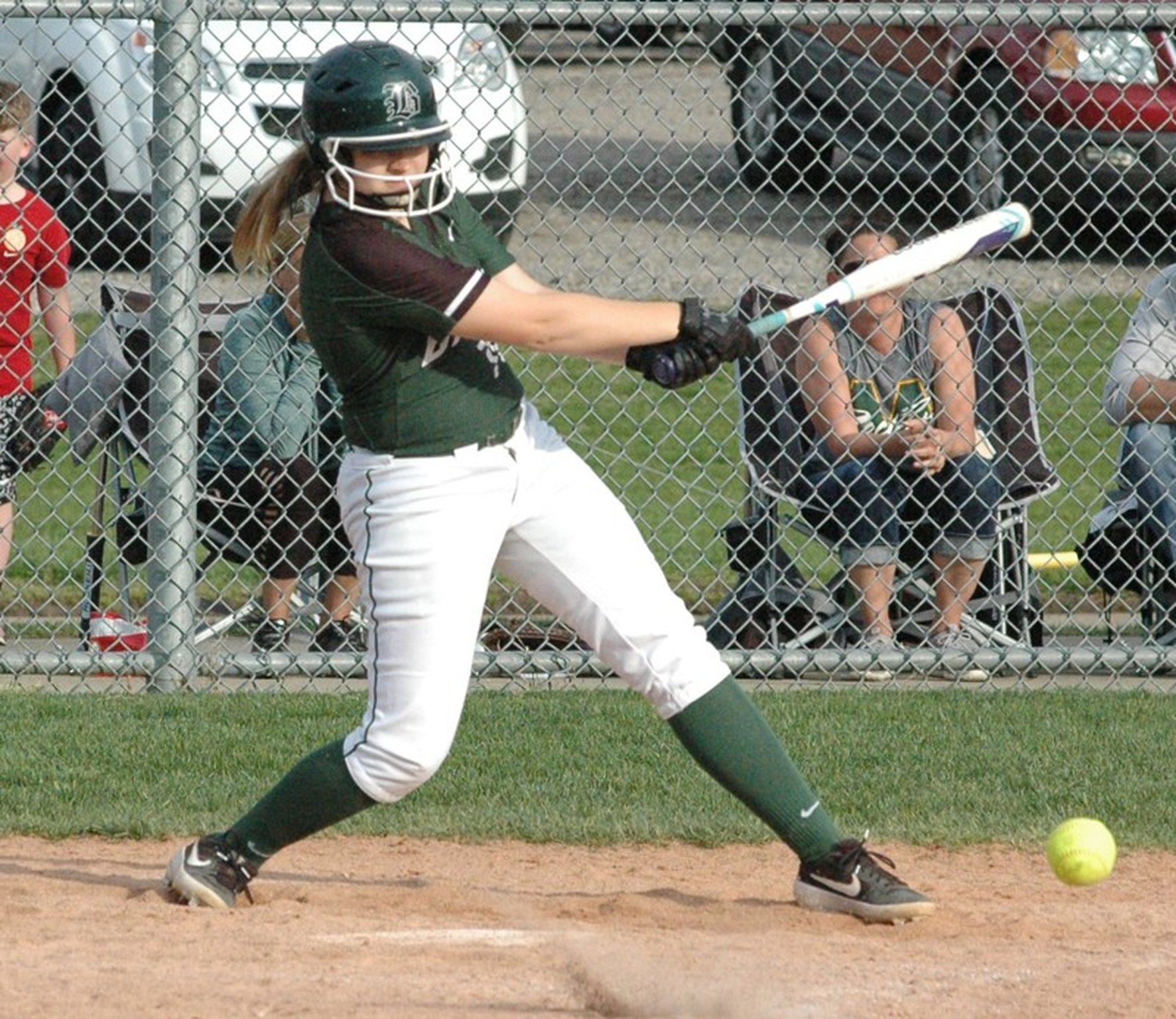 Badin’s Caitlin Smith (14) connects for a ground ball April 17during a Greater Catholic League Coed Division softball game against visiting McNicholas at Joyce Park. McNicholas won 4-3. RICK CASSANO/STAFF