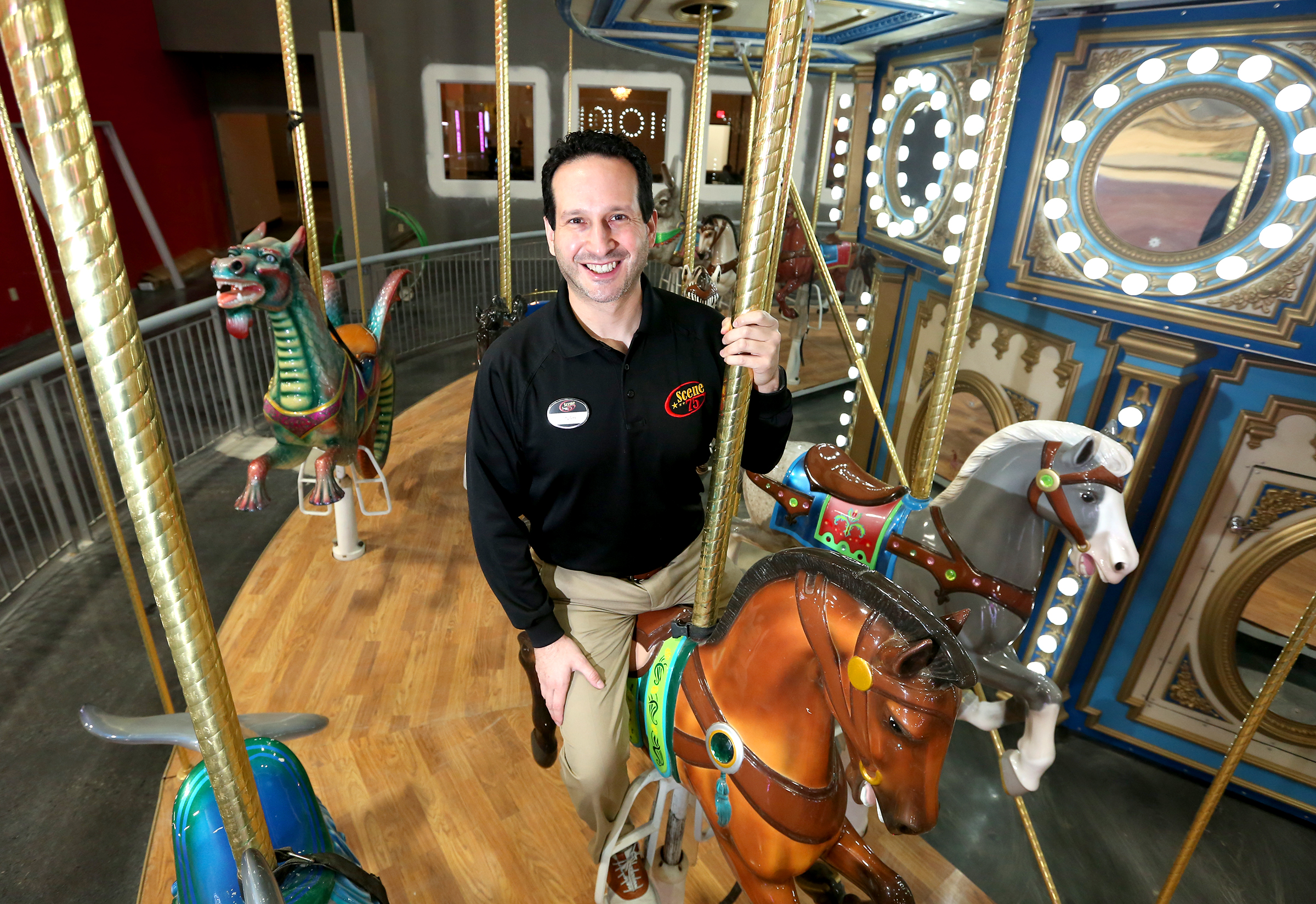 Jonah Sandler is the founder and chief entertainment officer of Scene75. The company is throwing a hiring party for anyone who applies for a job. LISA POWELL / STAFF