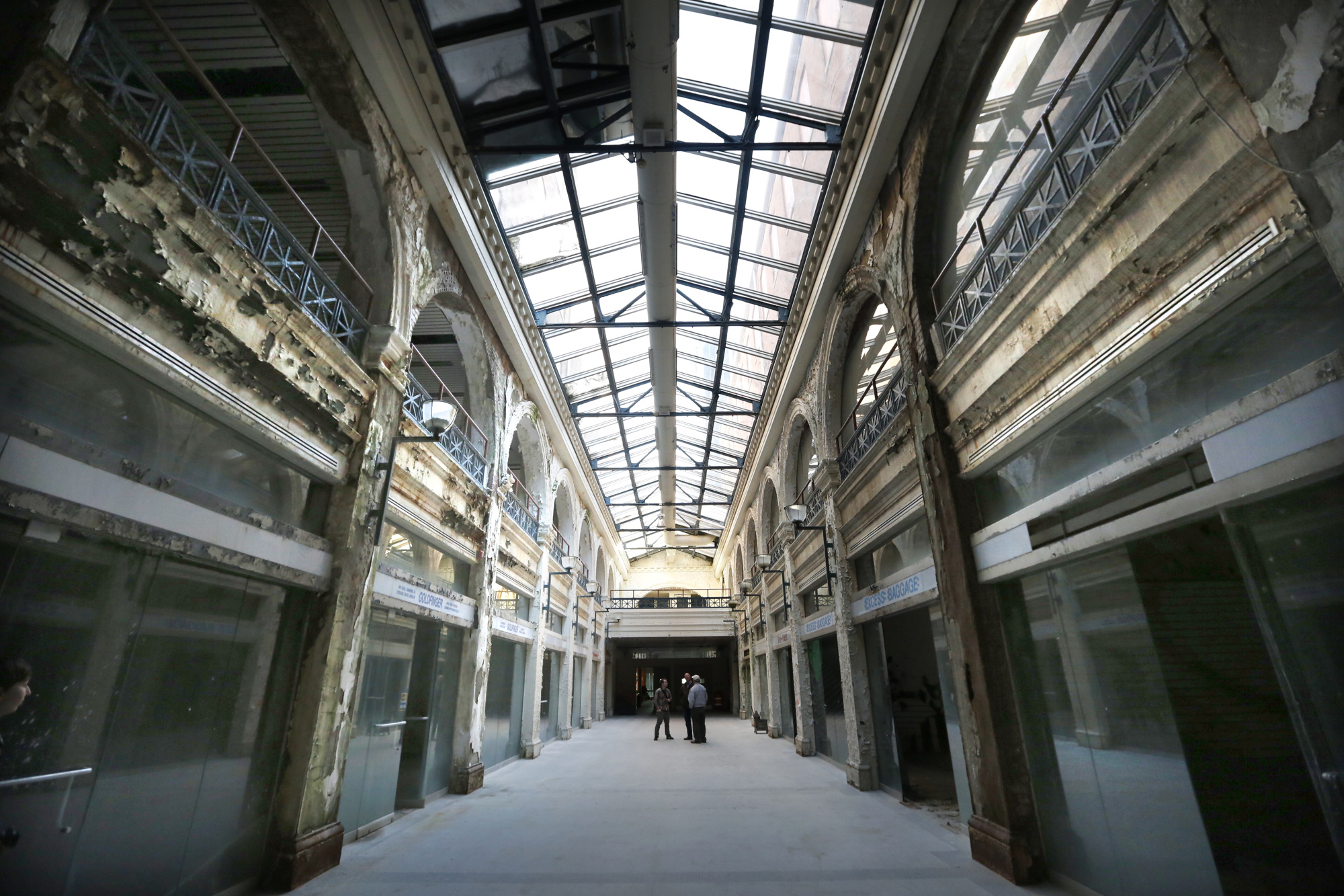 The Dayton Arcade, which opened in 1904, closed its doors for good in 1991. Shops once lined this passageway that leads from the Third Street entrance to the center rotunda area. LISA POWELL / STAFF