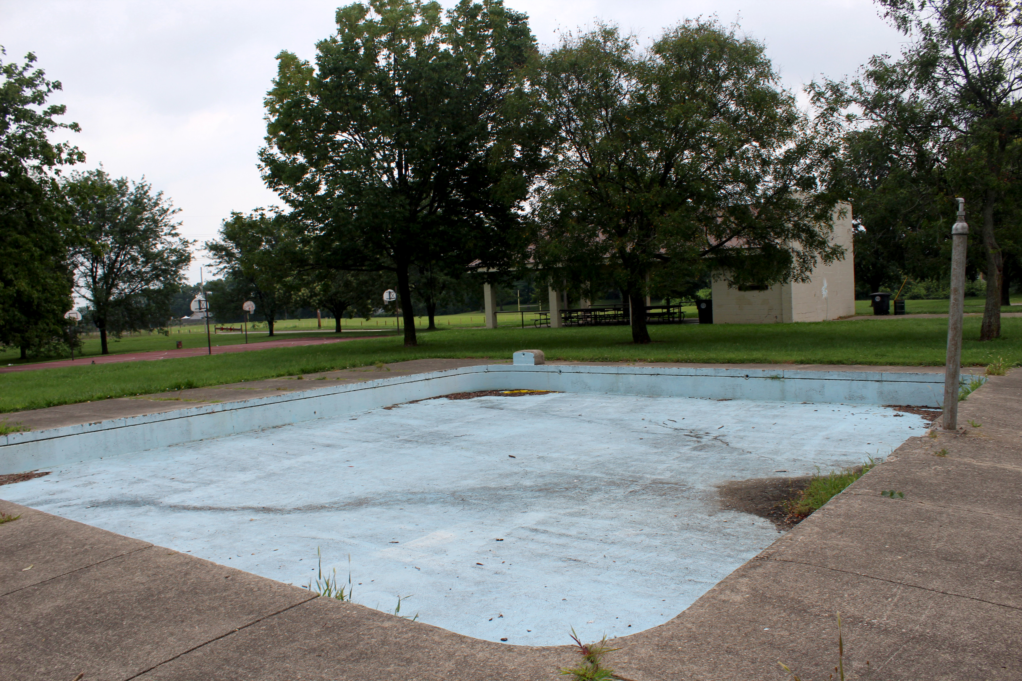 The Mural Machine and Belmont Eastmont Hearthstone Community Council are partnering for the The Mural Painting Party in the Park. Flowers will be added to an old kiddy pool and the park's shelter.