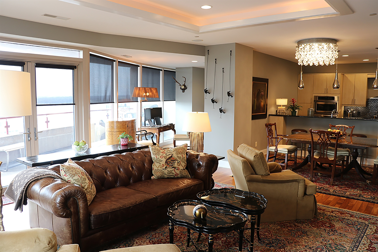 Brazilian cherry hardwood flooring fills the foyer and continues throughout the condominium, with the exception of the bathrooms which have ceramic-tile flooring. The foyer hallway wraps around and opens into a great room space that combines the living room, dining room and kitchen. CONTRIBUTED PHOTO BY KATHY TYLER