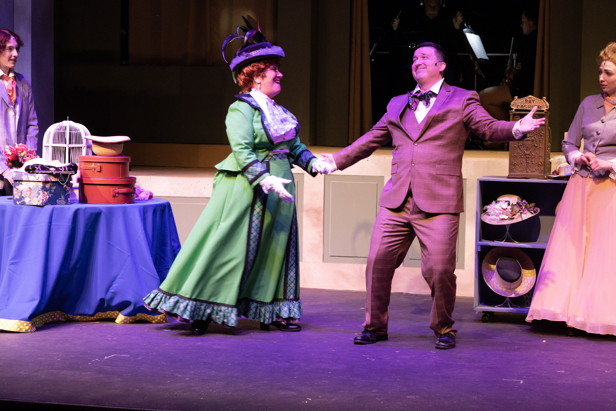 left to right: Kevin Willardson (Barnaby Tucker), Tina McPhearson (Dolly Levi), Chris Nelson (Cornelius Hackl) and Logan Richardson (Irene Malloy) in Dayton Playhouse's production of "Hello, Dolly!" PHOTO BY RICK FLYNN PHOTOGRAPHY