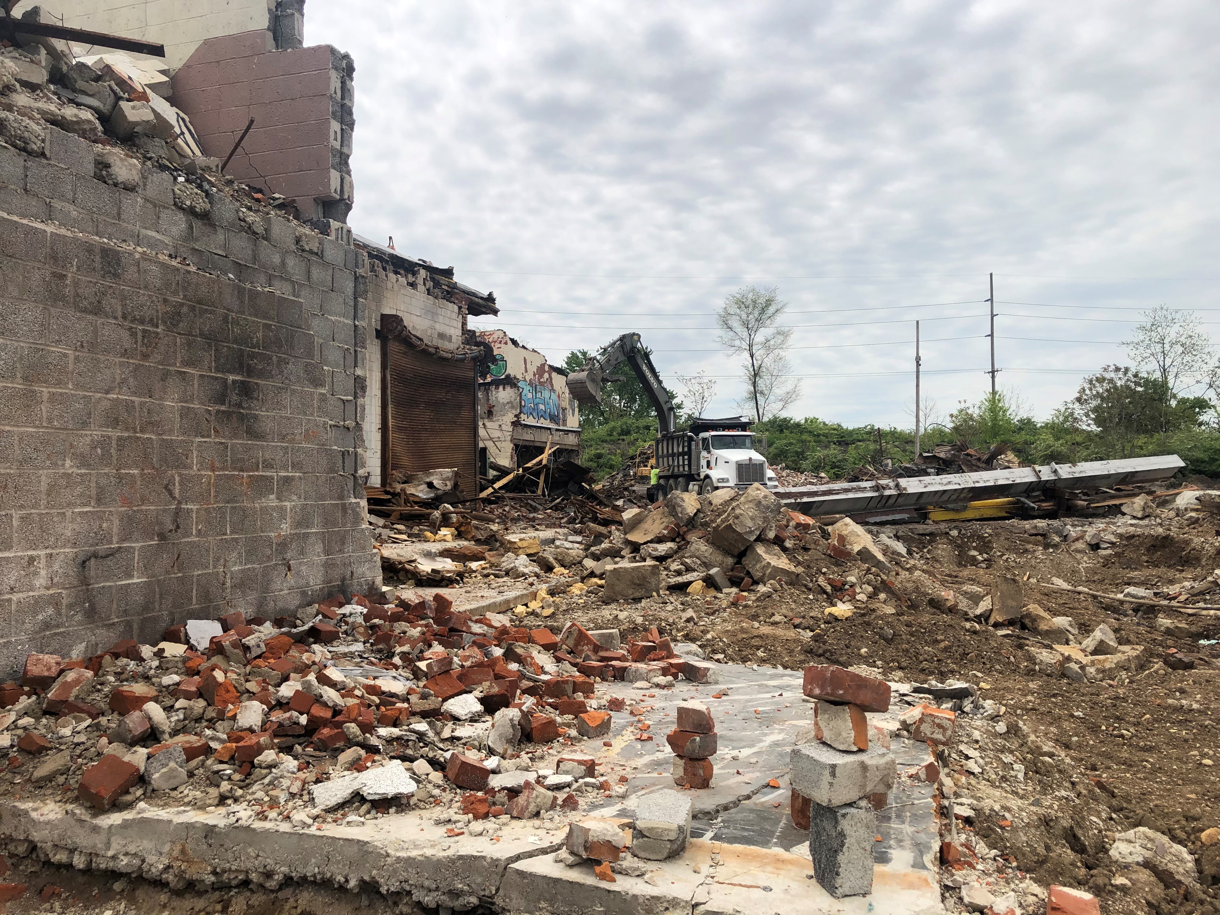 Demolition crews work at the Hewitt Soap Factory site earlier this month. CORNELIUS FROLIK / STAFF
