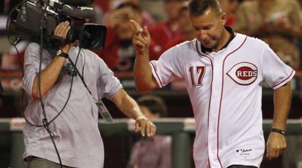 WLWT - Cincinnati Reds third baseman Chris Sabo leaps in the air