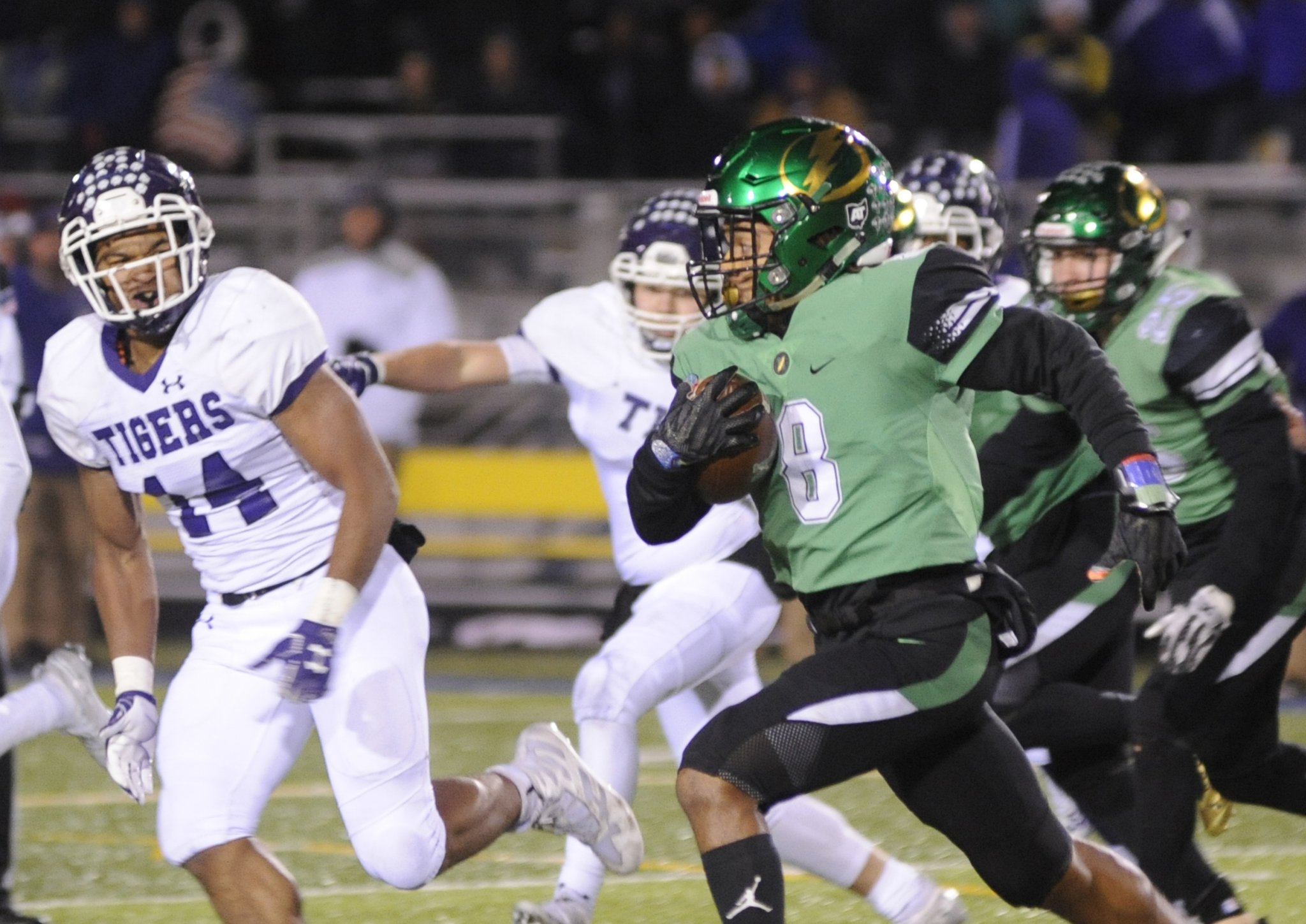 Northmont’s Danny Lewis (with ball) is pursued by Central’s Isaiah O’Connor (14). Pickerington Central defeated Northmont 33-7 in a D-I, Region 3 semifinal at Springfield s Evans Stadium on Friday, Nov. 9, 2018. MARC PENDLETON / STAFF