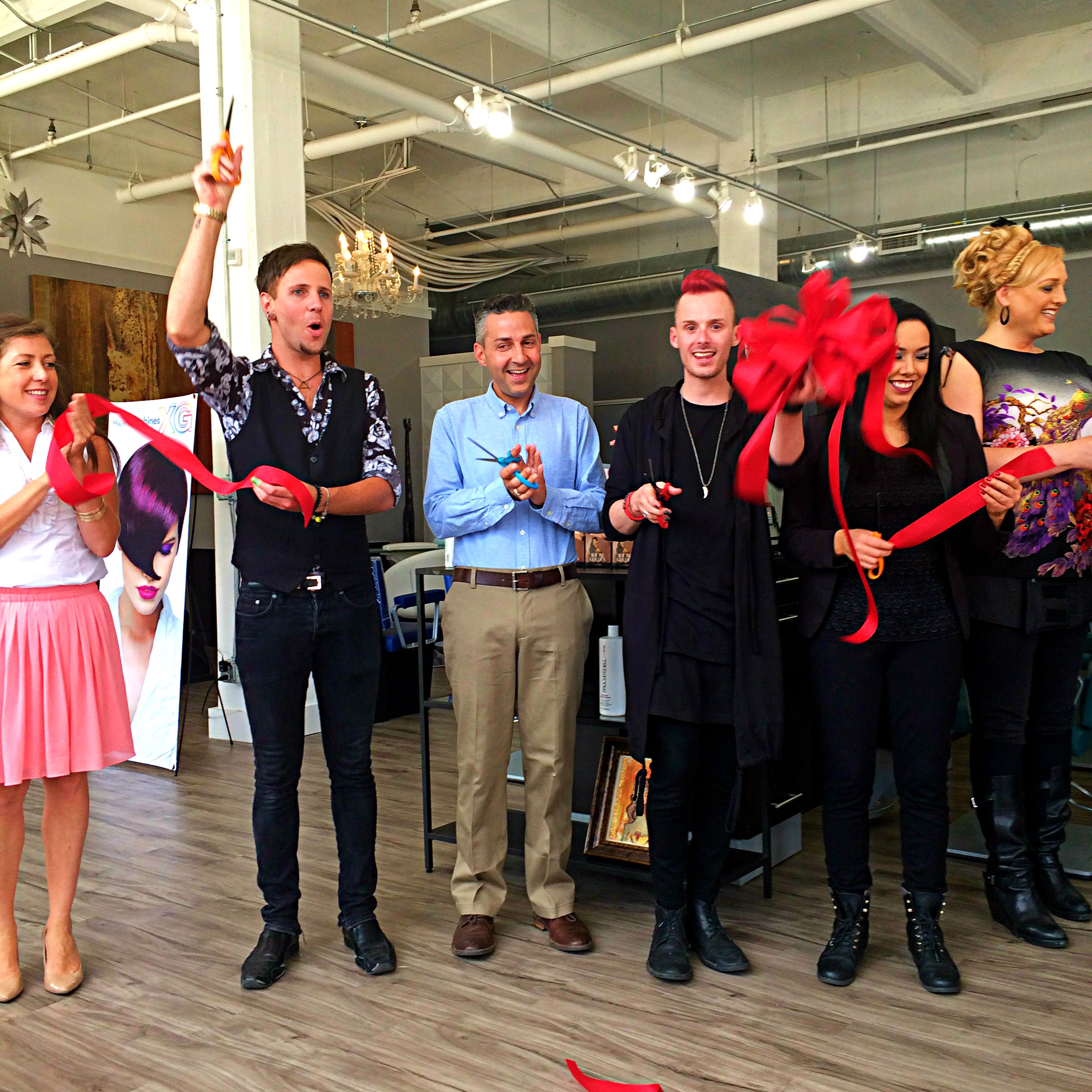The Salon J. Ladner and Spa family celebrate their ribbon-cutting on Thursday, June 18, 2015. Salon J. Ladner and Spa is now open and ready for business in their new space at 45 St. Clair Ave, just a few spaces down from their former location but over four times bigger and with new services. Book a hair cut and color, manicure, facial, waxing or massage at salonjladner.com. VIVIENNE MACHI / STAFF