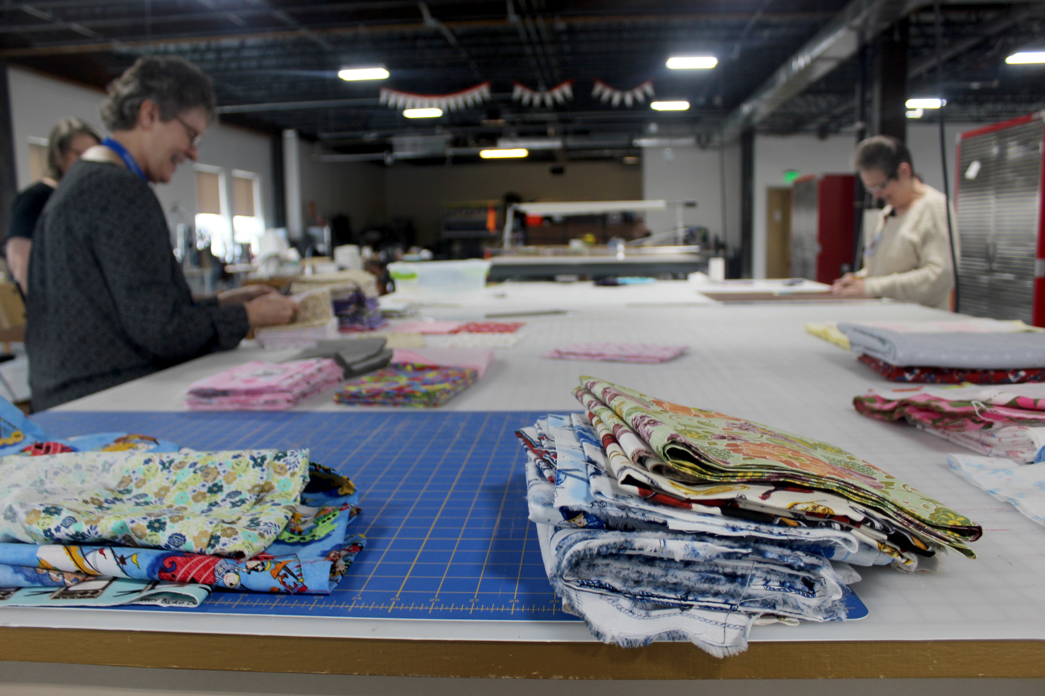 Since Friday, March 20, Dayton Sewing Collaborative volunteers in homes around the community have made hundreds of reusable face mask for local organization who need them as worries mount of the coronavirus. Volunteers Tursia Turner (right) and Bonnie Craigo are pictured.