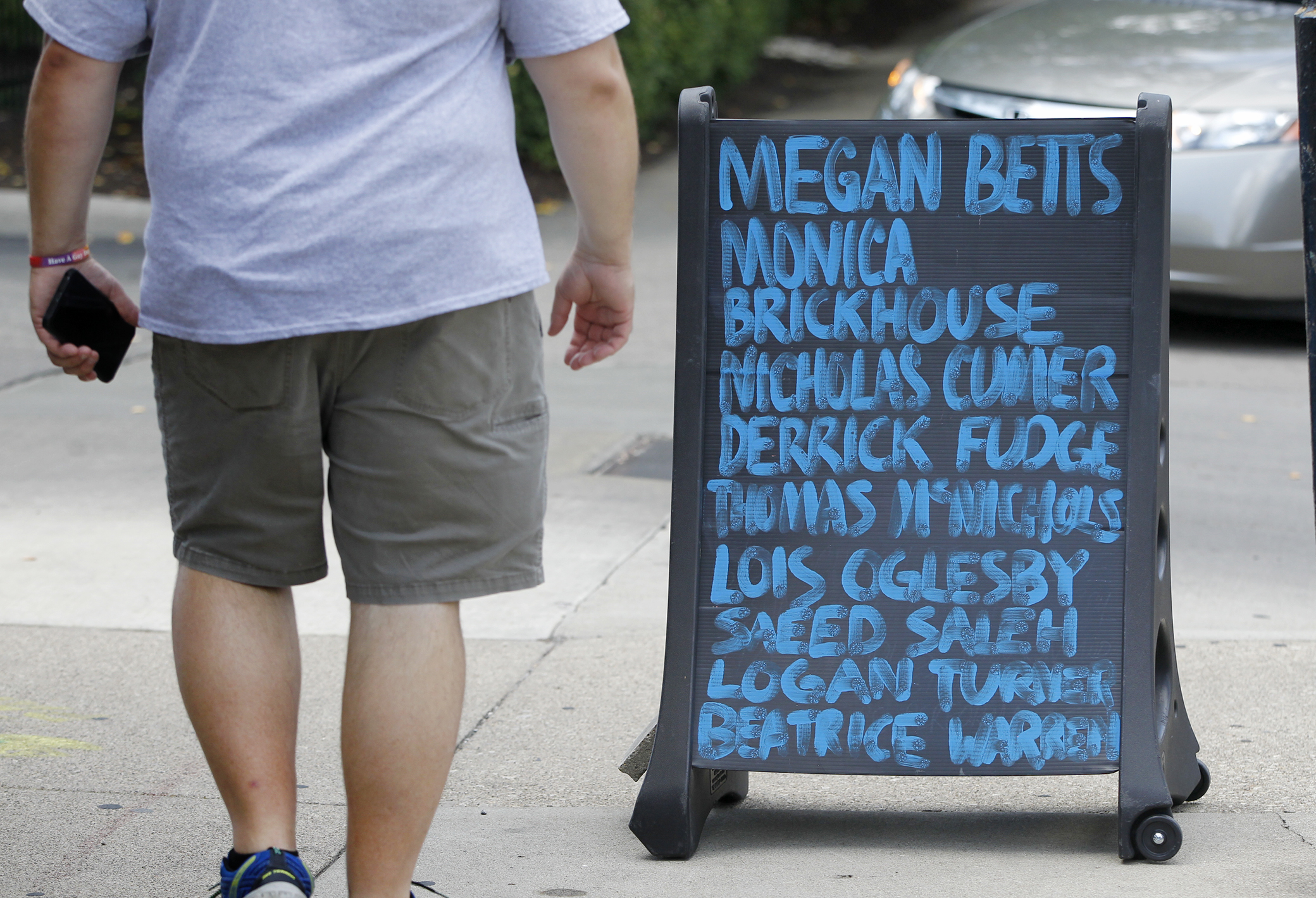 A sign in the Oregon District recognizing the nine victims of the mass shooting on Aug. 4, 2019. LISA POWELL / STAFF