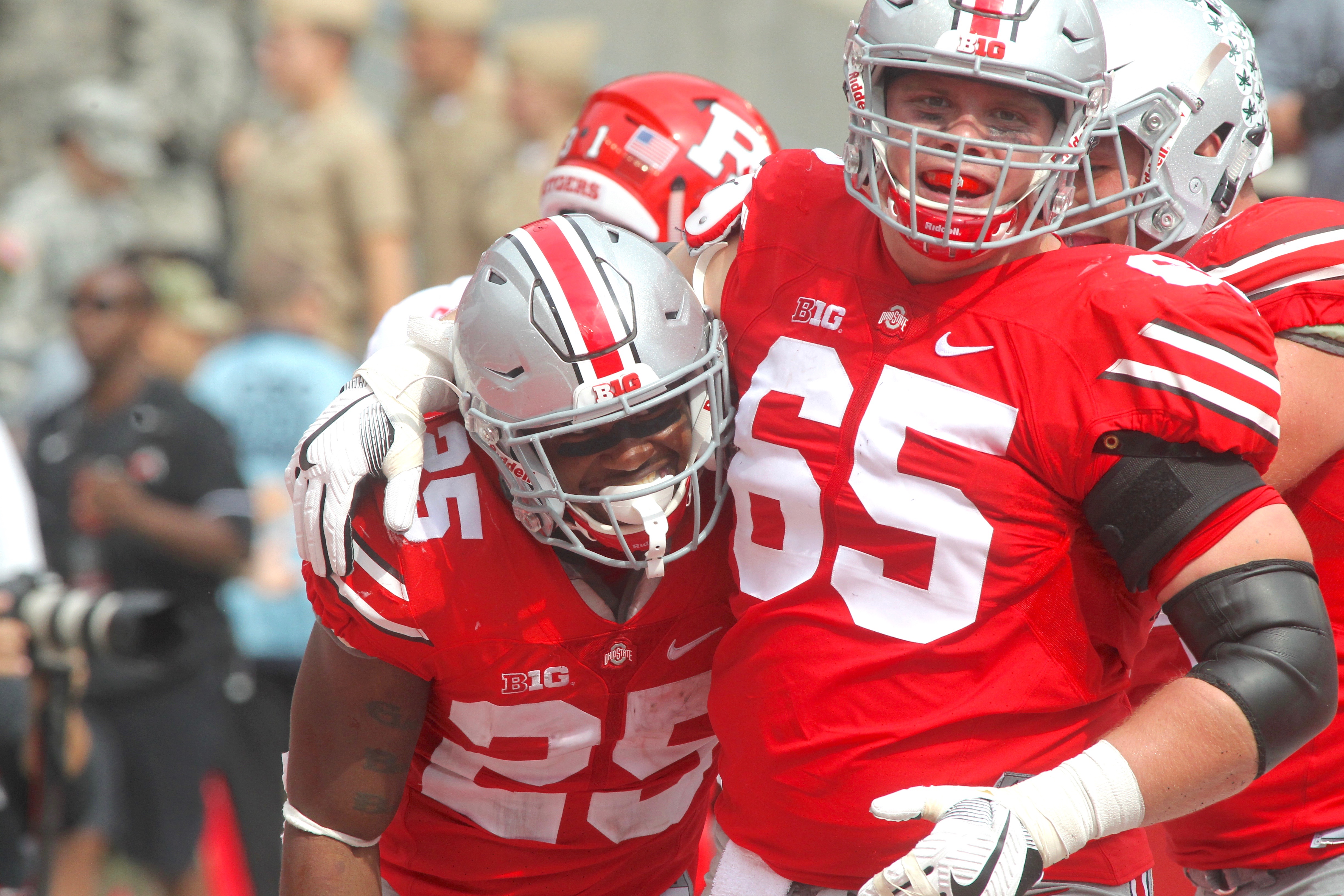 Ohio State's Mike Weber, left, and Pat Elflein celebrate a touchdown against Rutgers on Saturday, Oct. 1, 2016, at Ohio Stadium in Columbus. David Jablonski/Staff