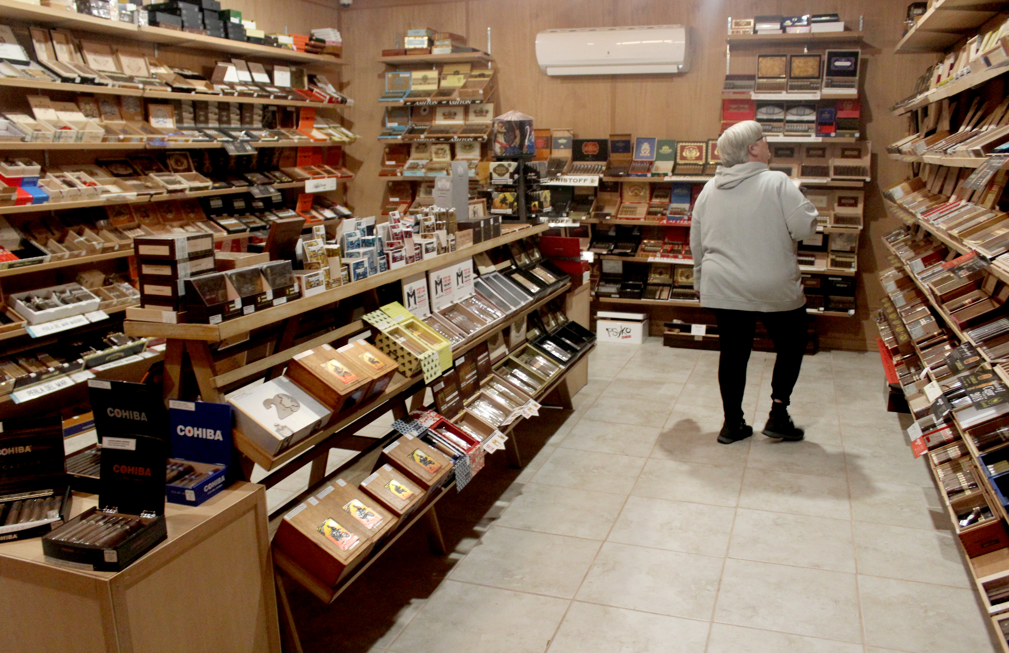 Gonzo Gonzales and his husband Bryan Emerson celebrated the grand opening of B&G's Cigar Lounge on Feb. 7, 2020. It was Super Bowl weekend. A shopper in the humidor room.