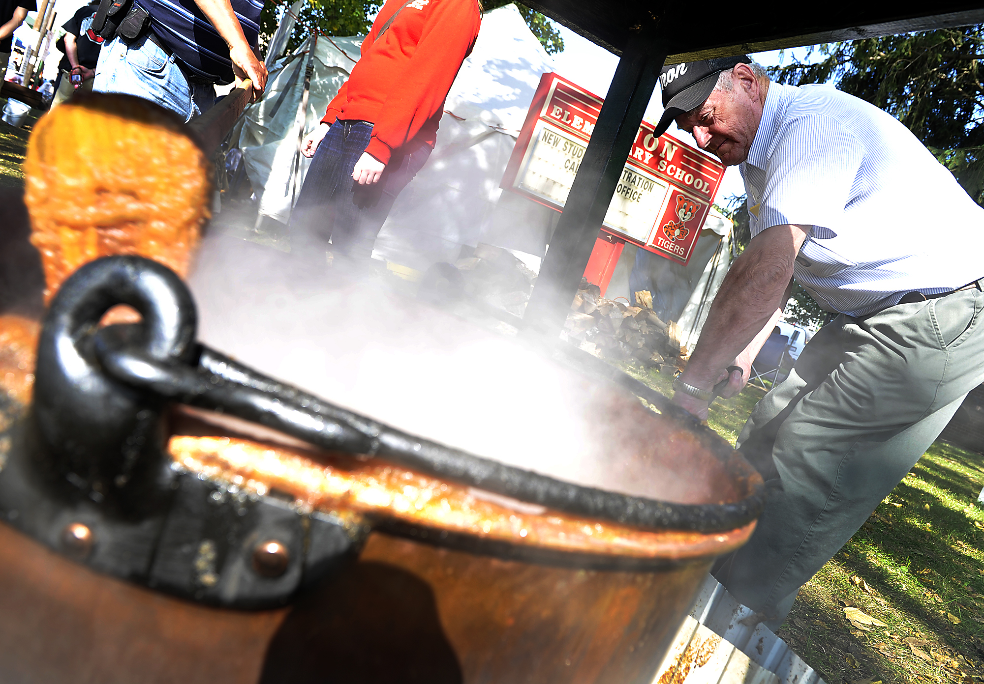 A bubbling cauldron of apple butter.