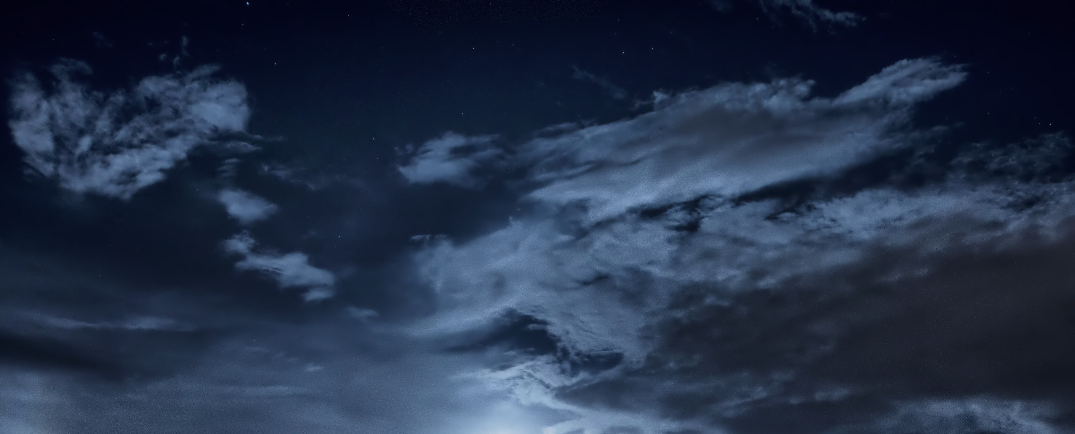partly cloudy night sky