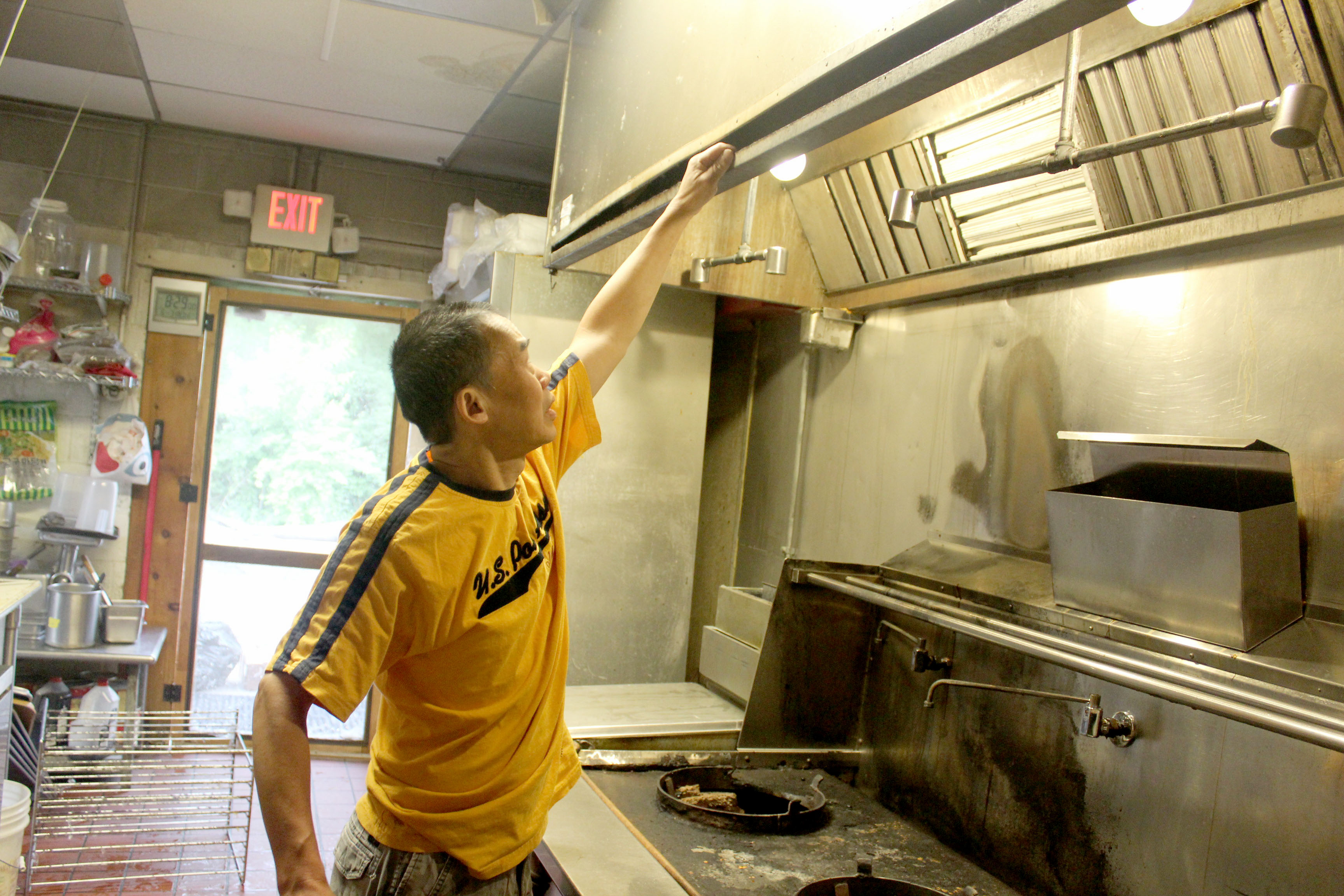 Little Saigon Restaurant, 1718 Woodman Dr. in Kettering, plans to reopen July 25. Bao Thoi, a co-owner, points to damaged caused by the fire and the fire suppression system.