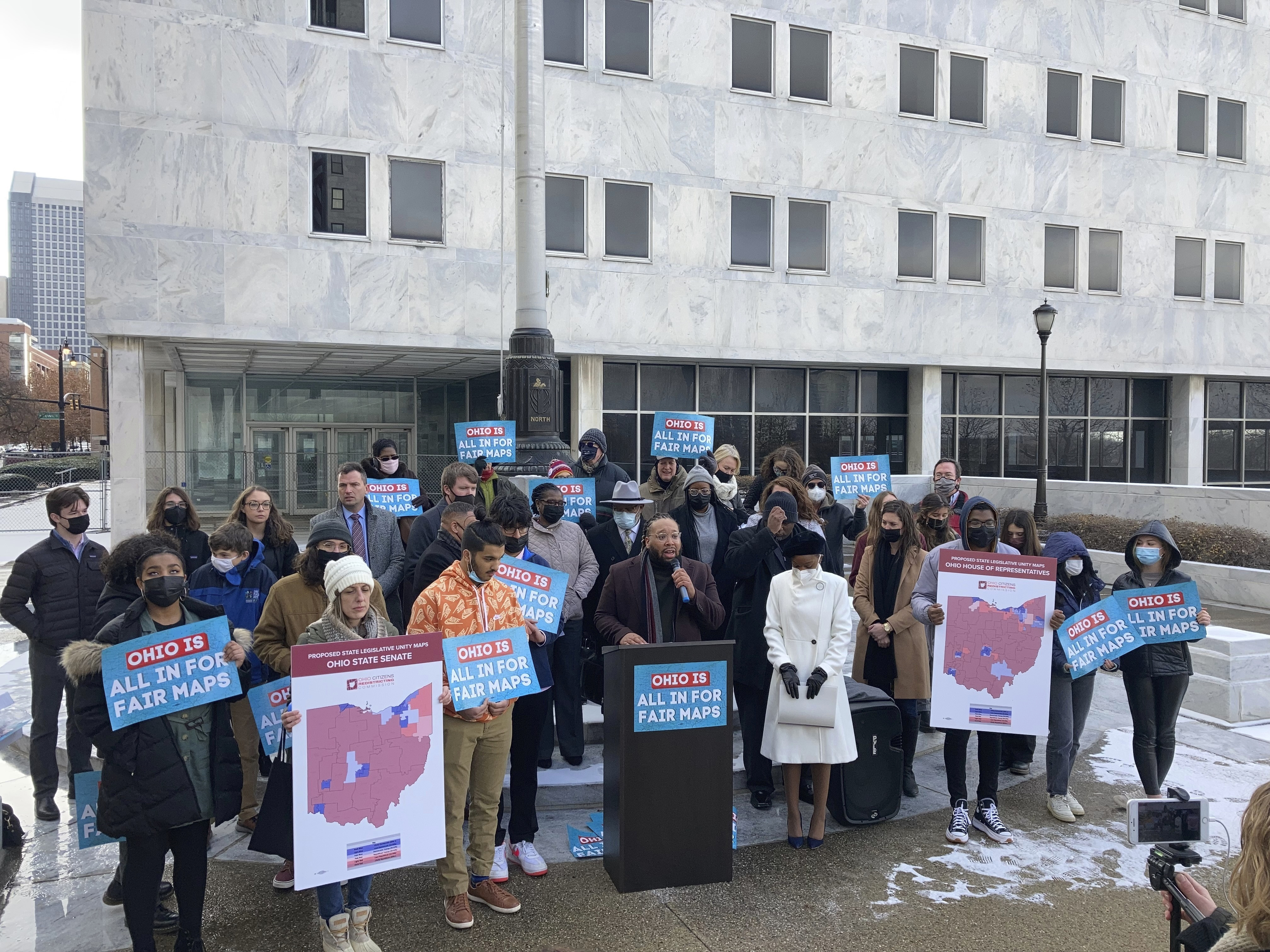 Advocates who believe that newly drawn Ohio legislative maps remain heavily gerrymandered rally outside the Ohio Supreme Court on Wednesday, Dec. 8, 2021, in Columbus, Ohio. The court on Wednesday Jan. 12, 2022 overturned the maps. (AP Photo/Andrew Welsh-Huggins)