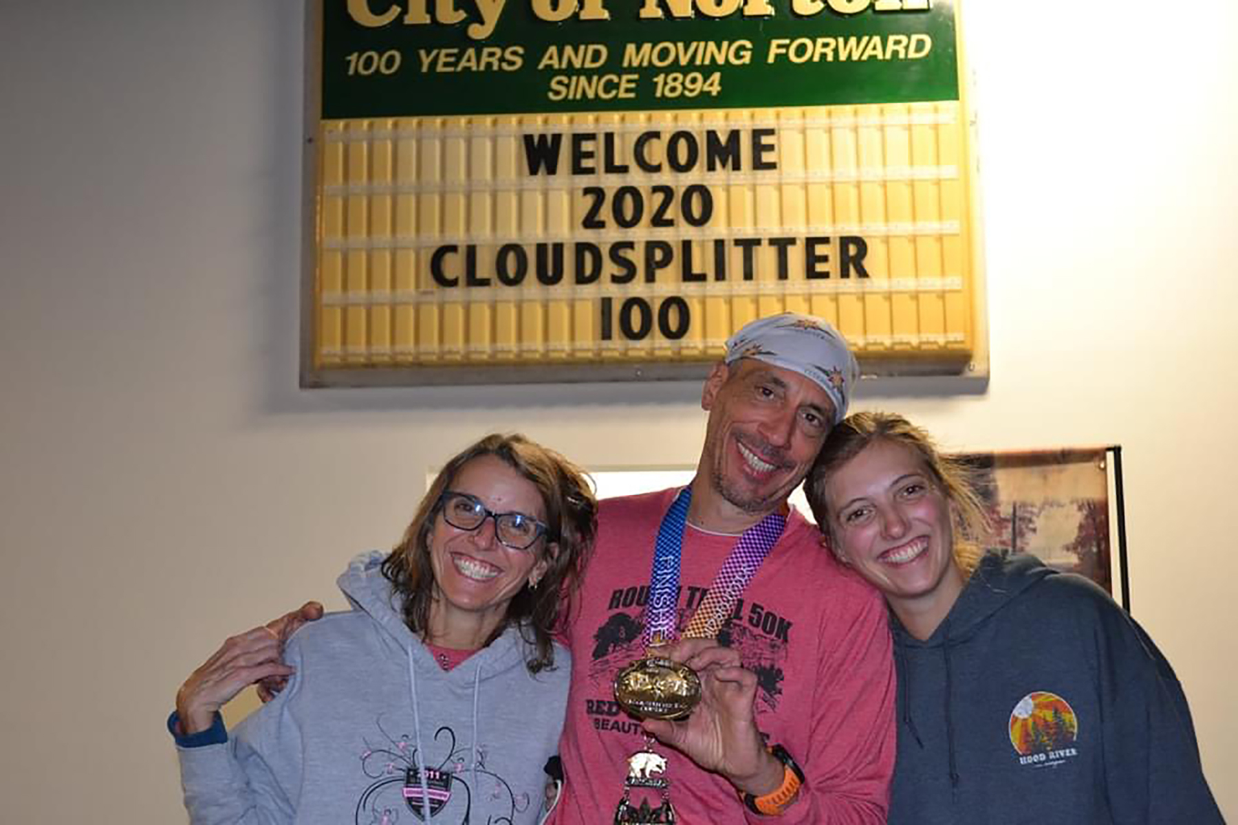 Randy Kreill called the Cloudsplitter 100 he finished in 2020 his "longest and toughest" race. Kreill ran this race in sandals, taking more than 37 hours over rugged remote mountains in Virginia. He stands  post-race with his wife Megan and daughter Lindsay.